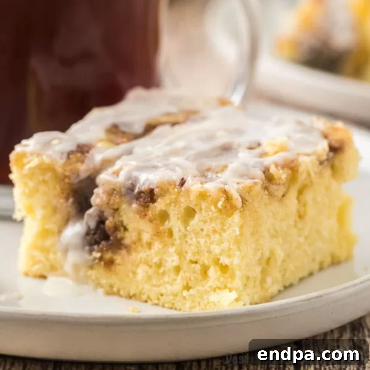 Indulgent Cinnamon Roll Cake Delight 1 featured 11856