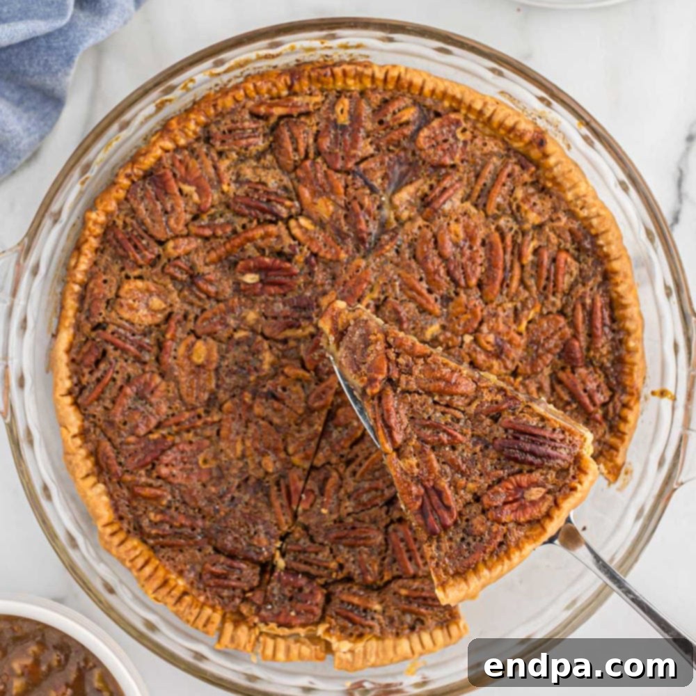 Paula Deen's Southern Comfort Pecan Pie 1 featured 55368