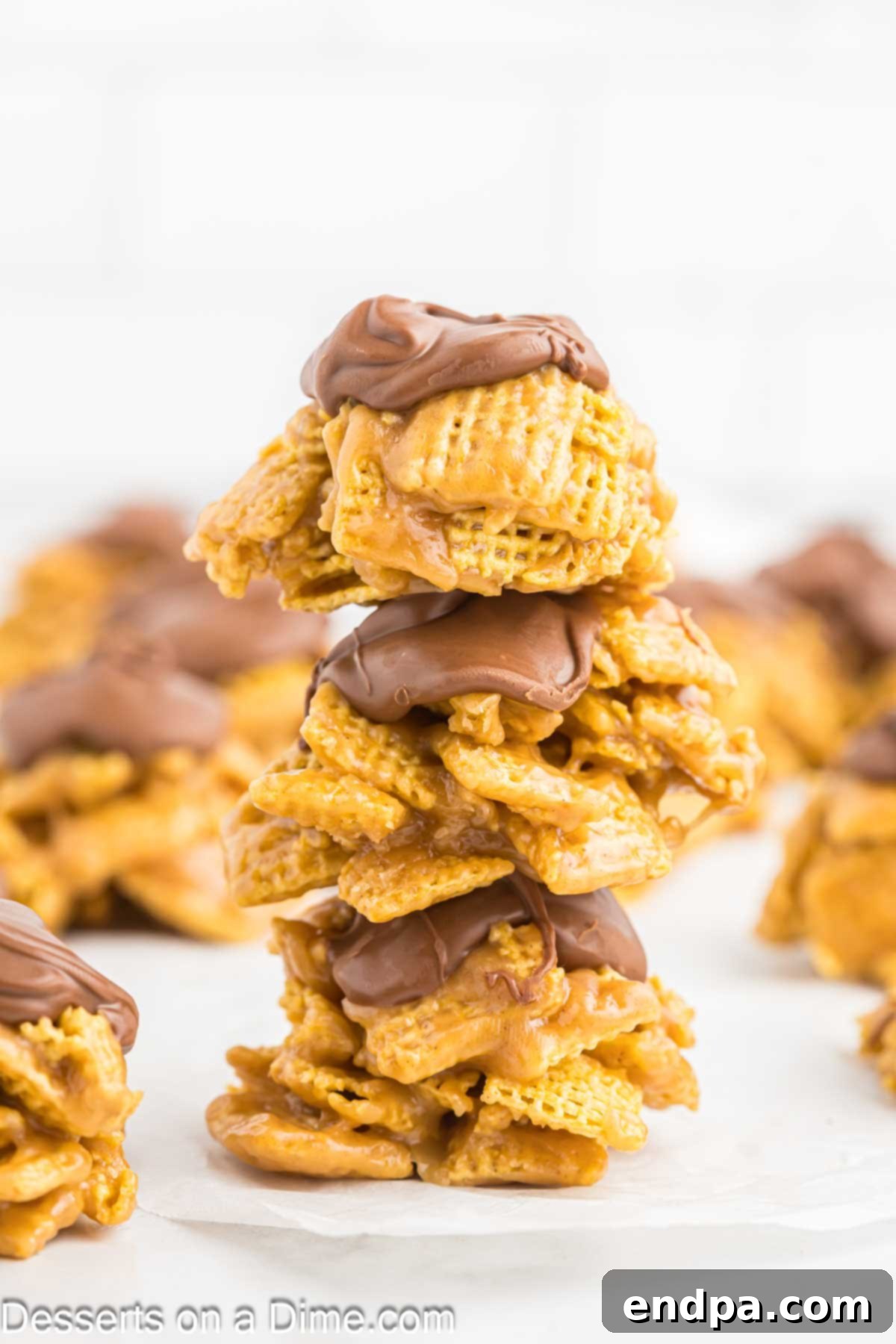 Chex Peanut Butterscotch Crunch 2 Stack of Chex Scotcheroos clusters topped with a luscious chocolate and butterscotch layer.