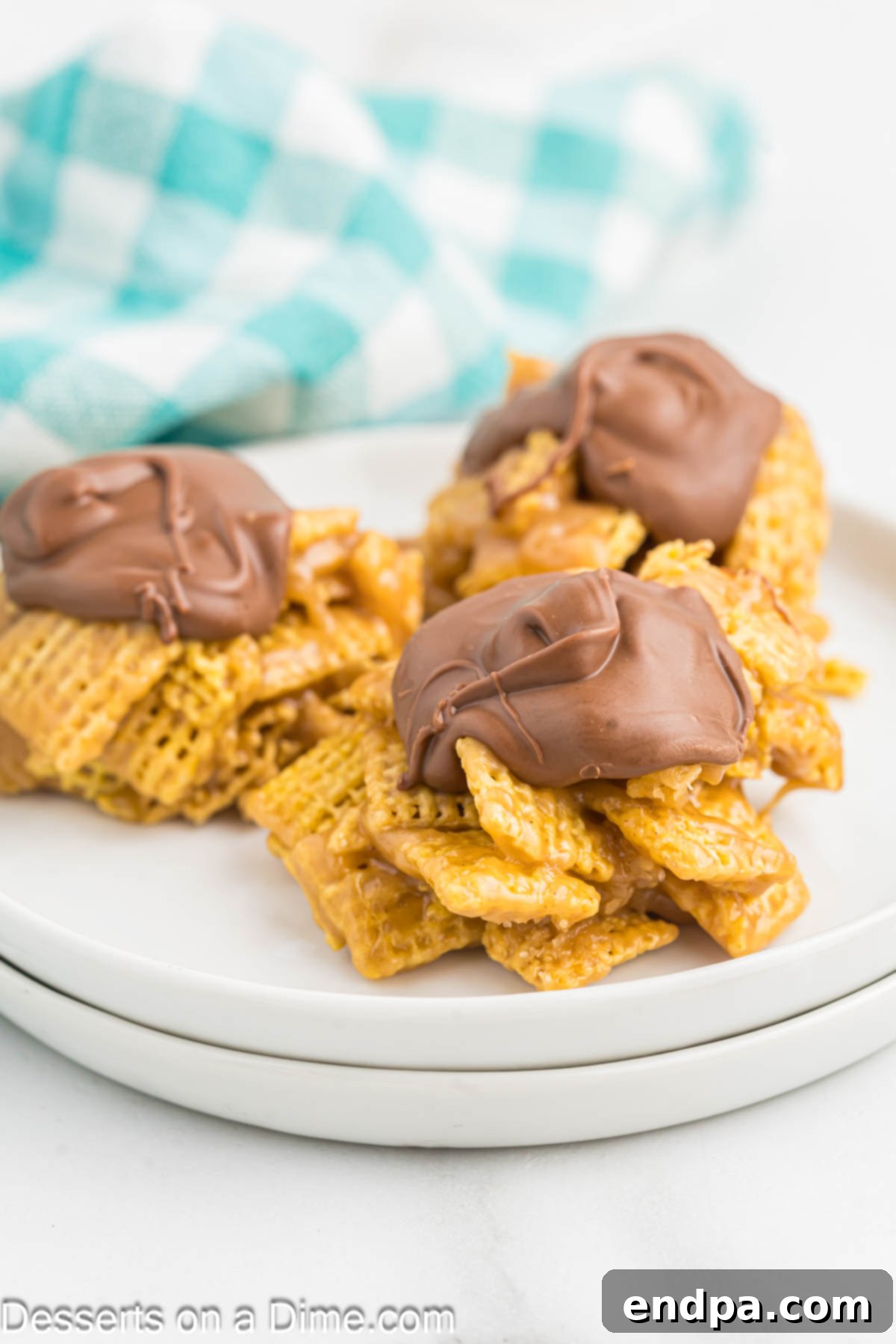 Chex Peanut Butterscotch Crunch 9 A plate of perfectly set Chex Scotcheroos, ready to be enjoyed.