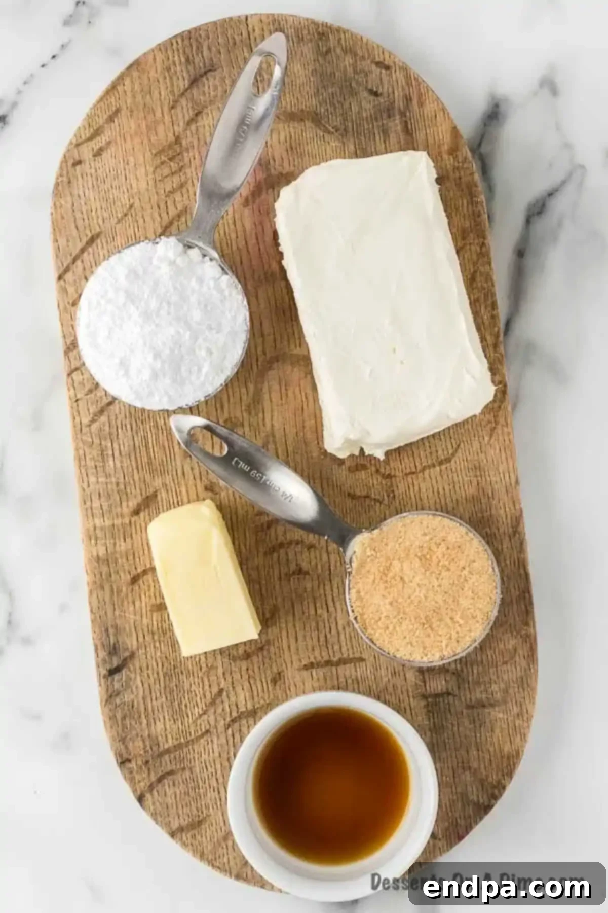 Heavenly Cheesecake Dip 3 A selection of basic ingredients for cheesecake dip: softened cream cheese, butter, powdered sugar, brown sugar, and vanilla extract.
