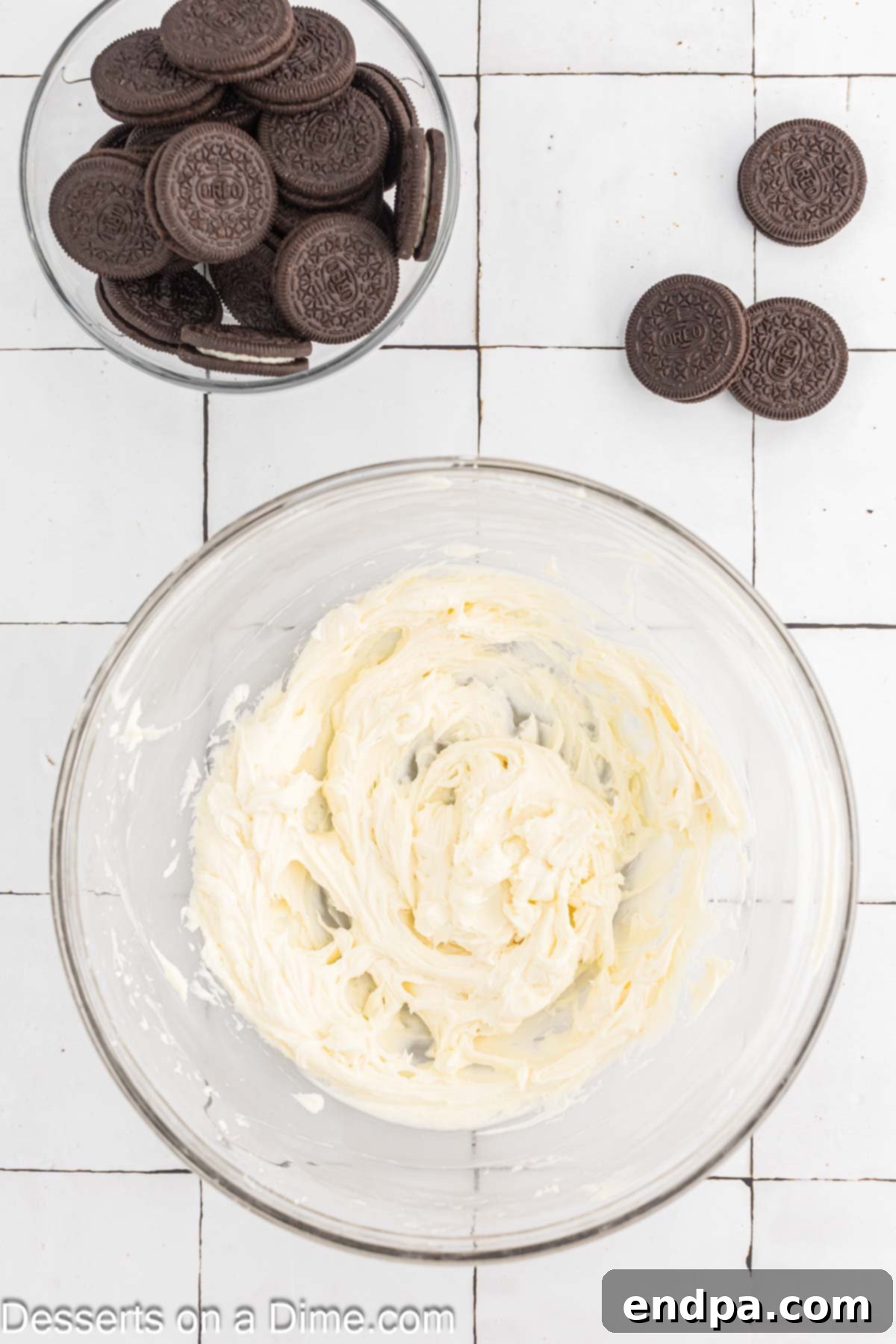 Decadent Oreo Dip 4 Mixing bowl with cream cheese and sugar combined.