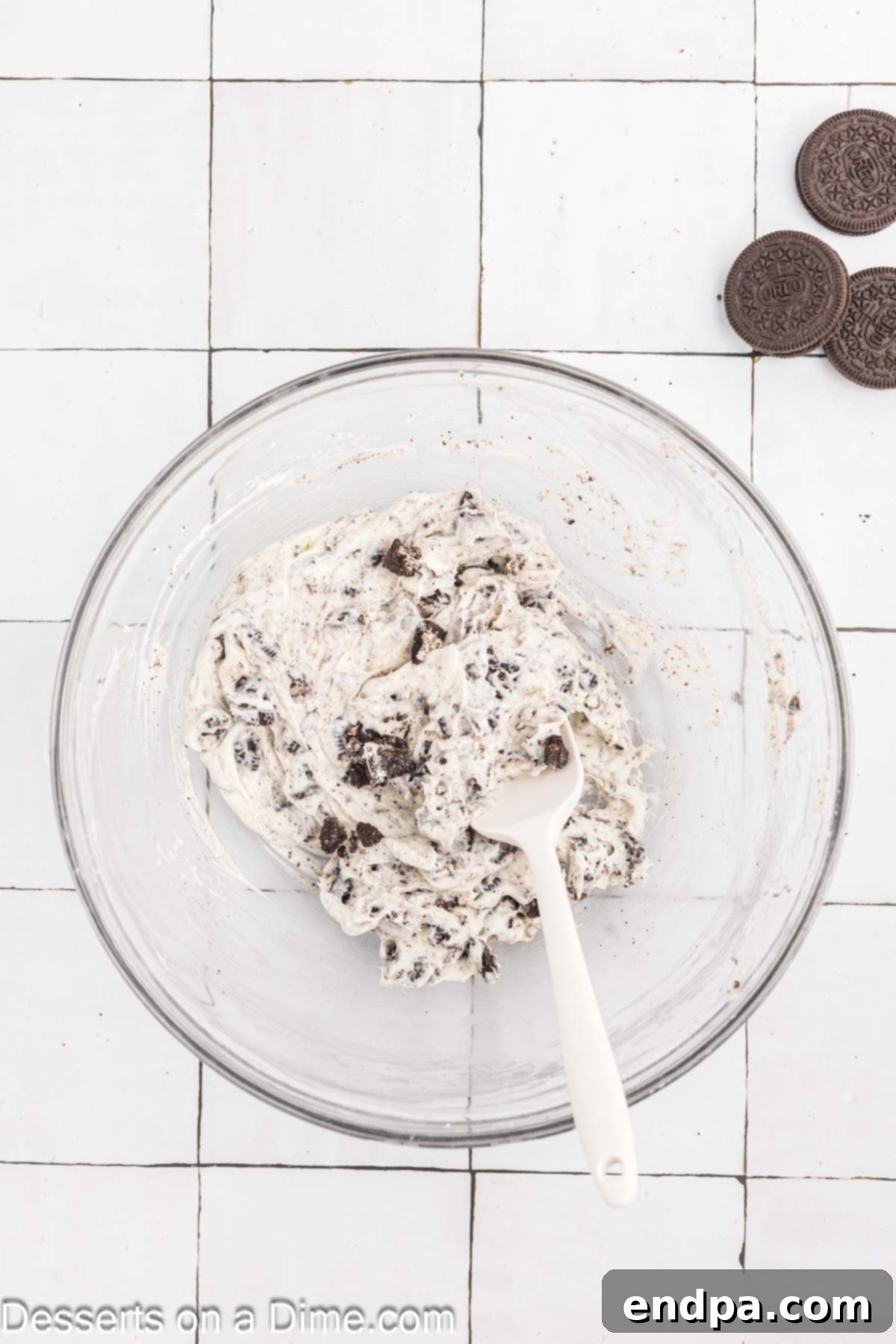 Decadent Oreo Dip 6 Cookies folded into cream cheese mixture.