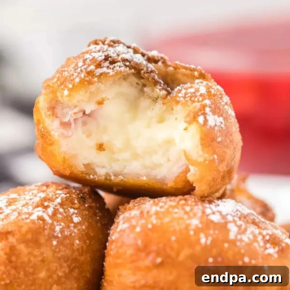 Crispy Cheesecake Indulgence 13 Deep Fried Cheesecake Bites, beautifully arranged and ready to be served.