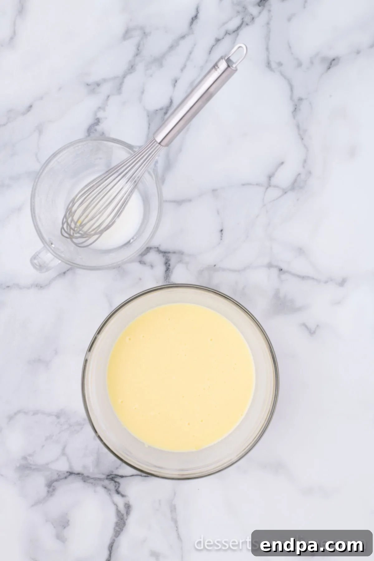 Smooth and creamy vanilla pudding mixture in a bowl, ready for the next step.