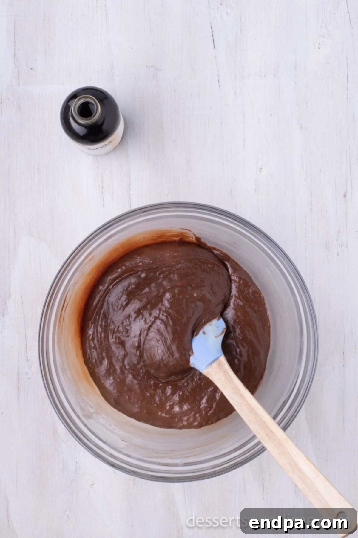 The perfectly smooth and glossy chocolate fudge mixture, fully combined and ready for the next step.