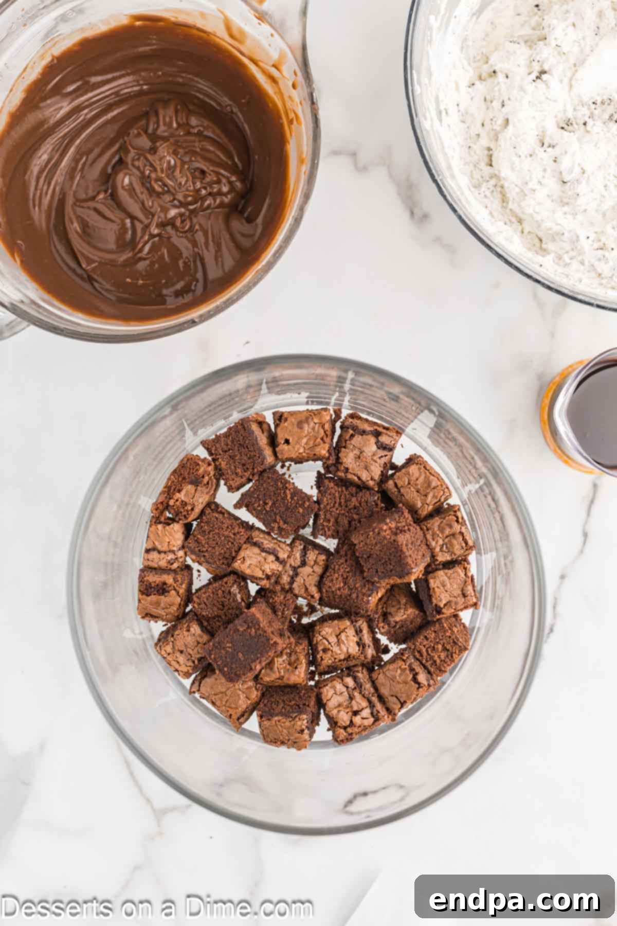 Oreo Dream Trifle 9 Brownies layered into trifle dish.