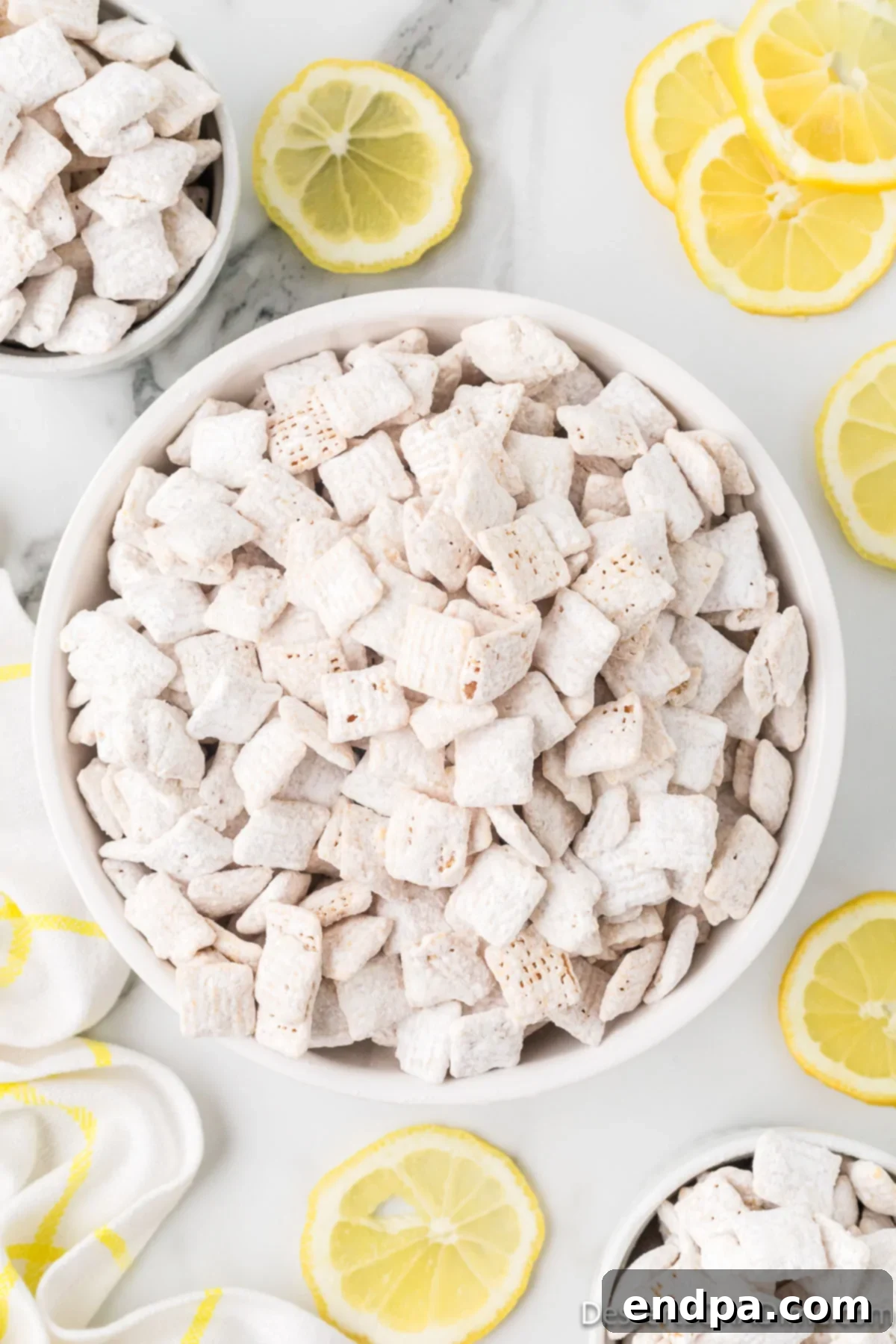Lemon puppy chow in a bowl, ready to be enjoyed.