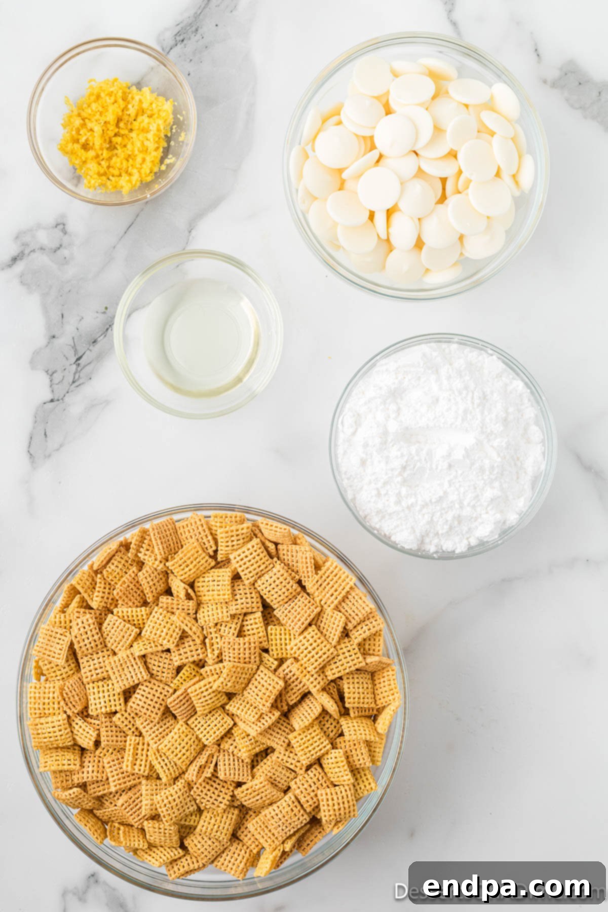 Ingredients for lemon puppy chow including Chex cereal, melting chocolate, lemon zest, powdered sugar, and oil.