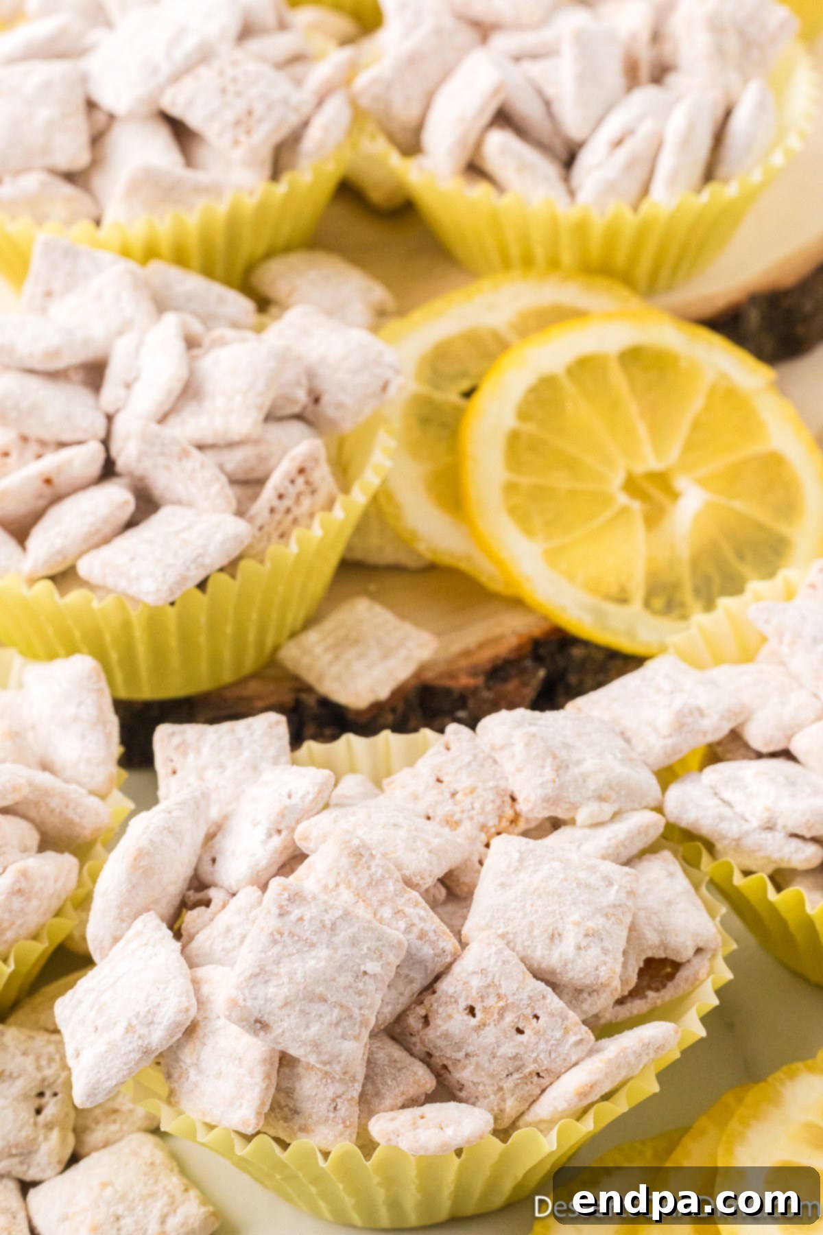 Lemon puppy chow served in individual paper cups.