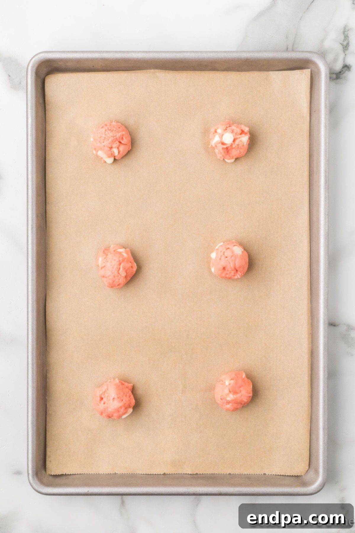 Cookie dough on baking sheet. 