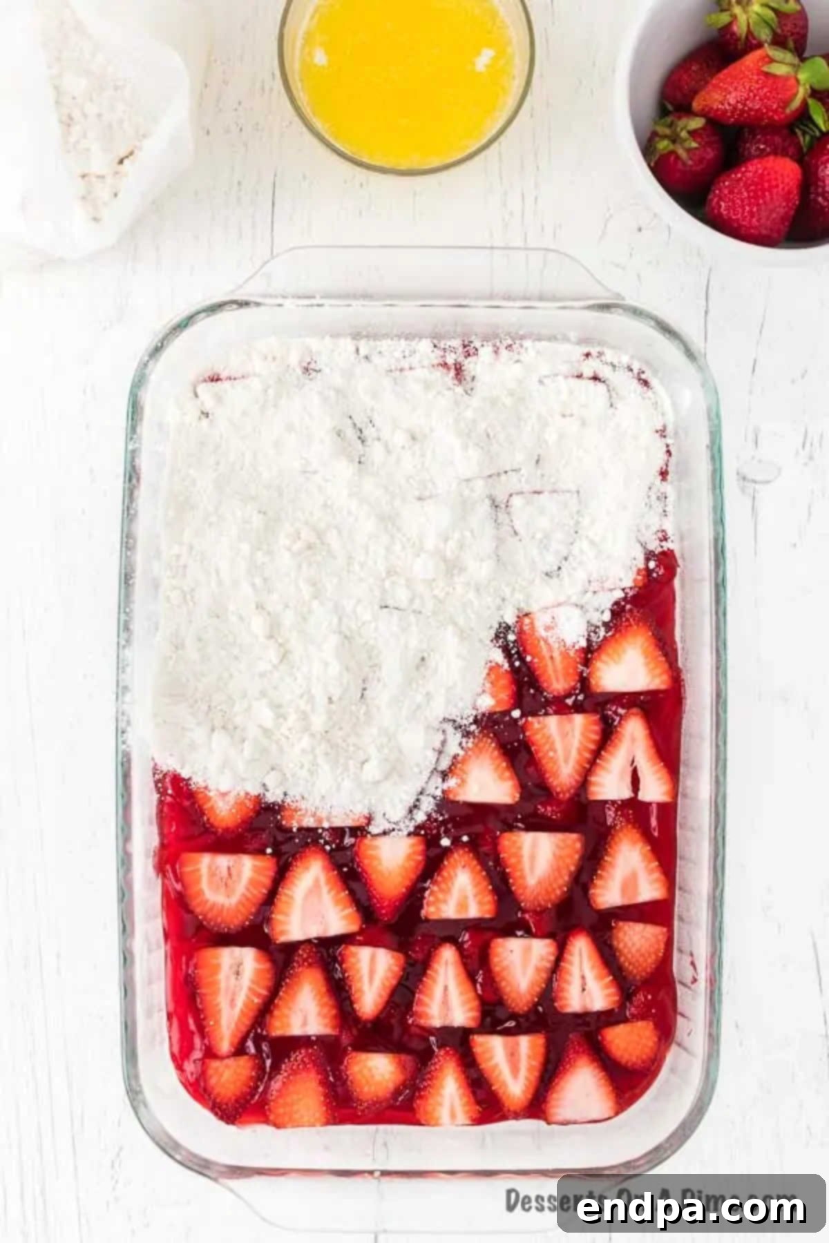 One-Pan Strawberry Bliss 6 Cake mix sprinkled on top.