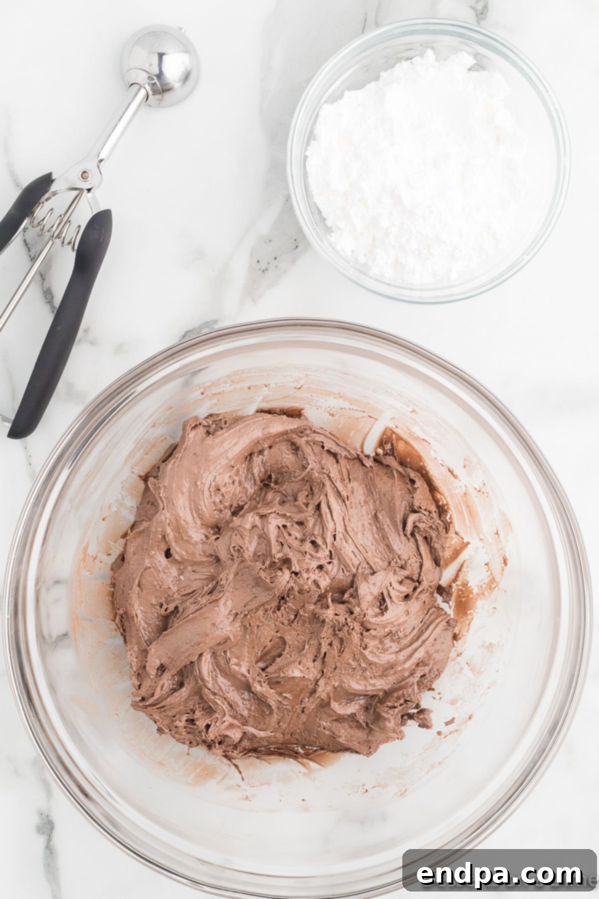 Cracked Cocoa Bliss 6 The thick chocolate cookie dough mixture in a bowl.
