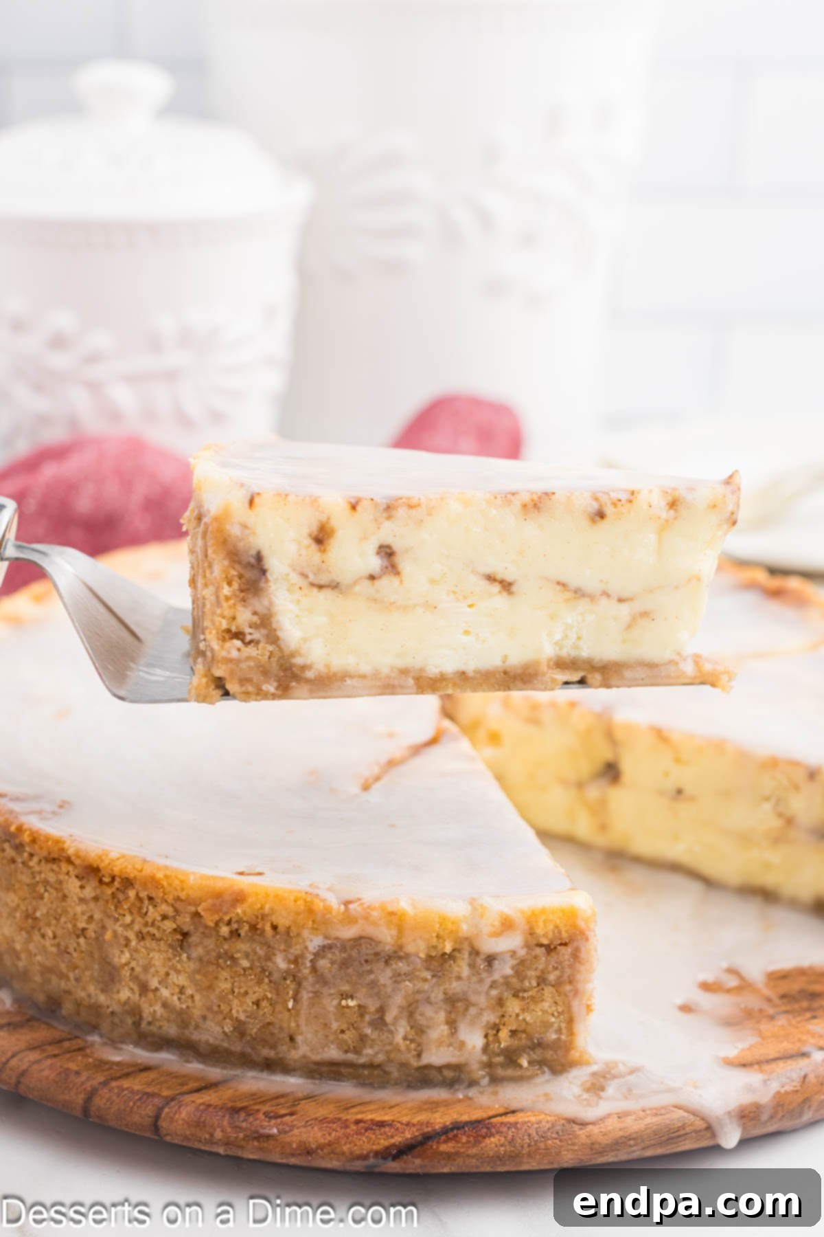 Golden Honey Swirl Cheesecake 2 Honey Bun Cheesecake being sliced.