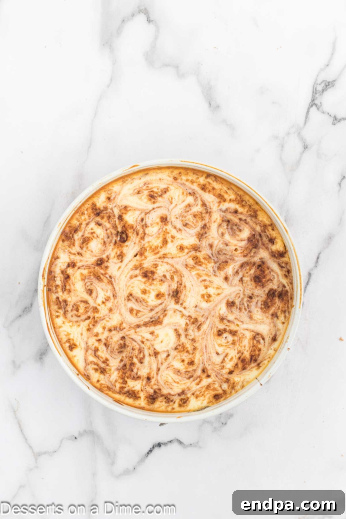 Golden Honey Swirl Cheesecake 11 Cheesecake baked and cooling.