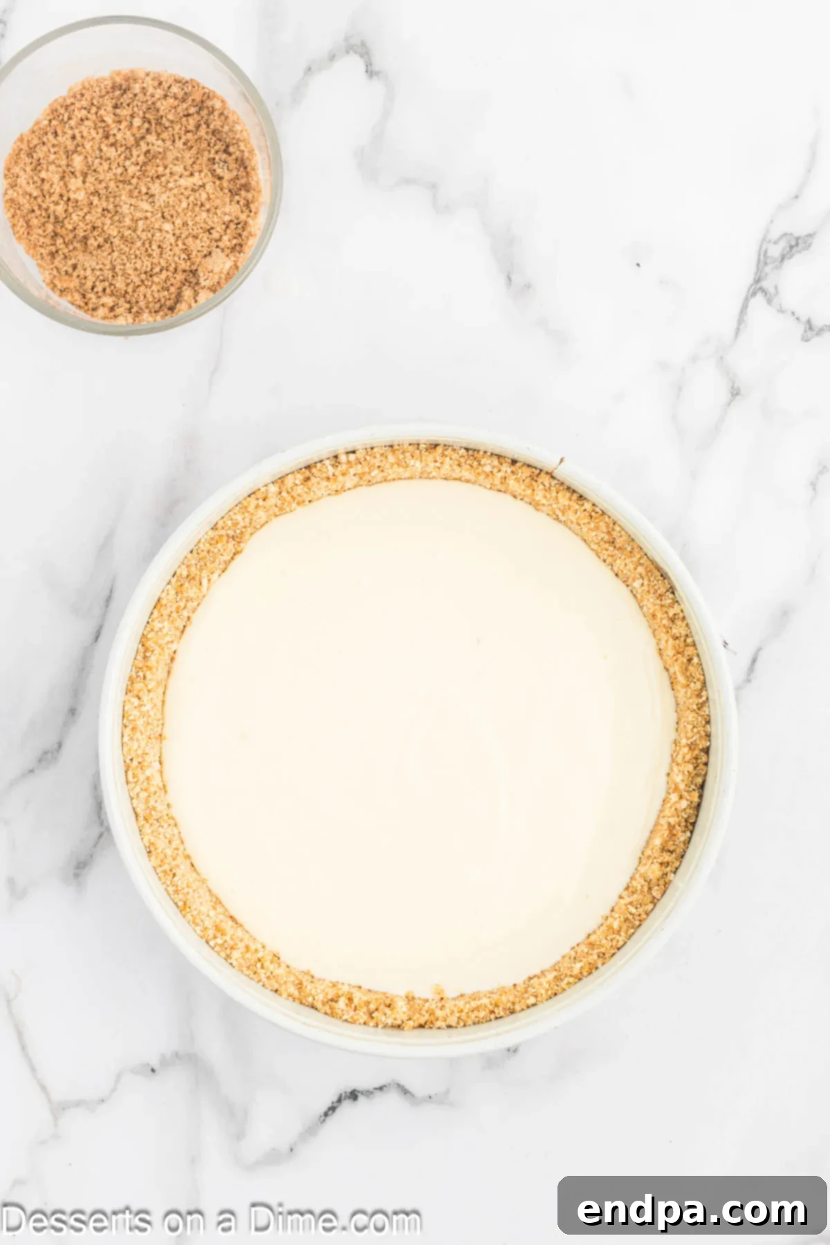 Golden Honey Swirl Cheesecake 7 Cream cheese mixture poured on top of crust.