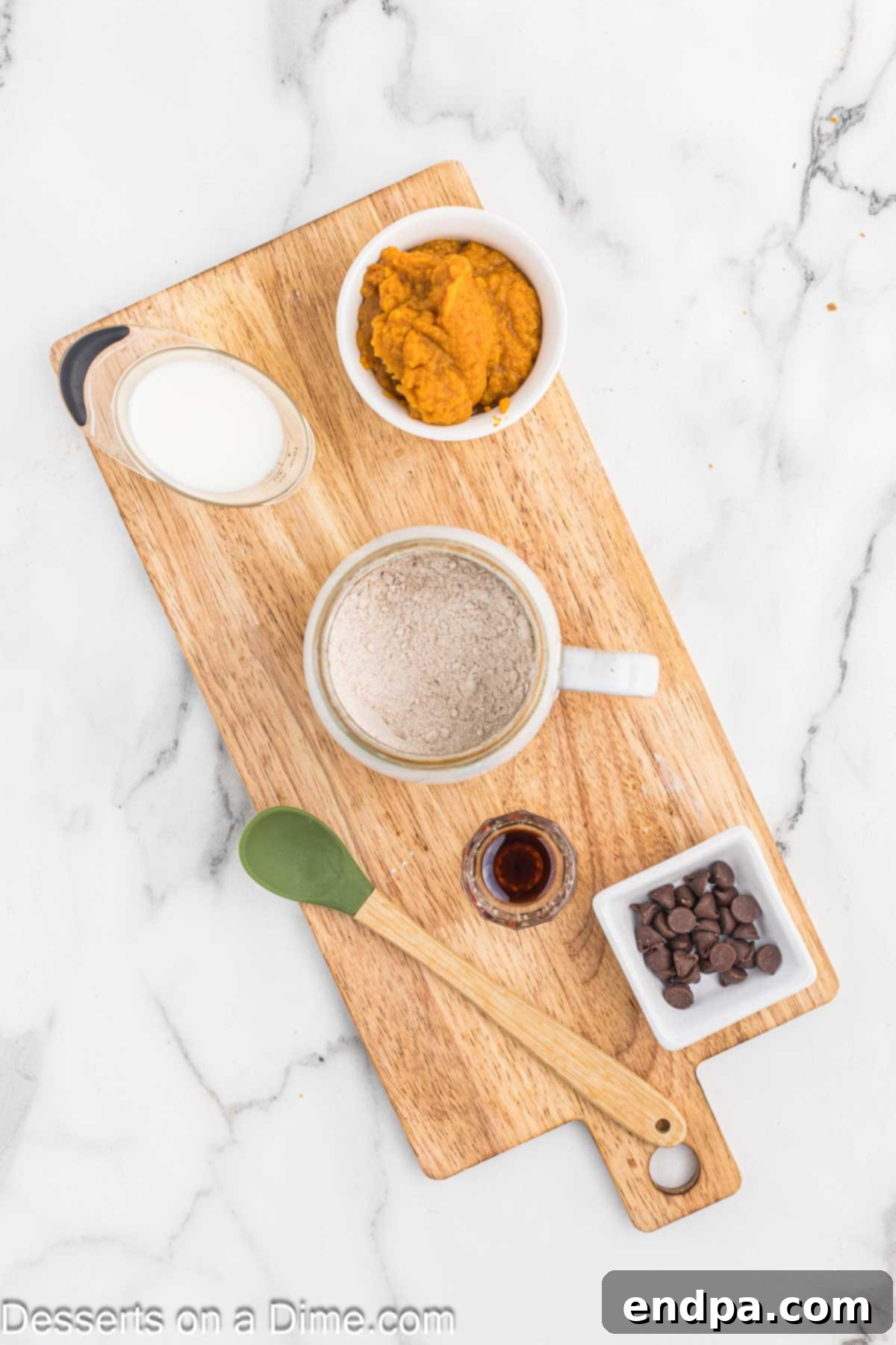 Dry ingredients combined in a mug to make Pumpkin Mug Cake.