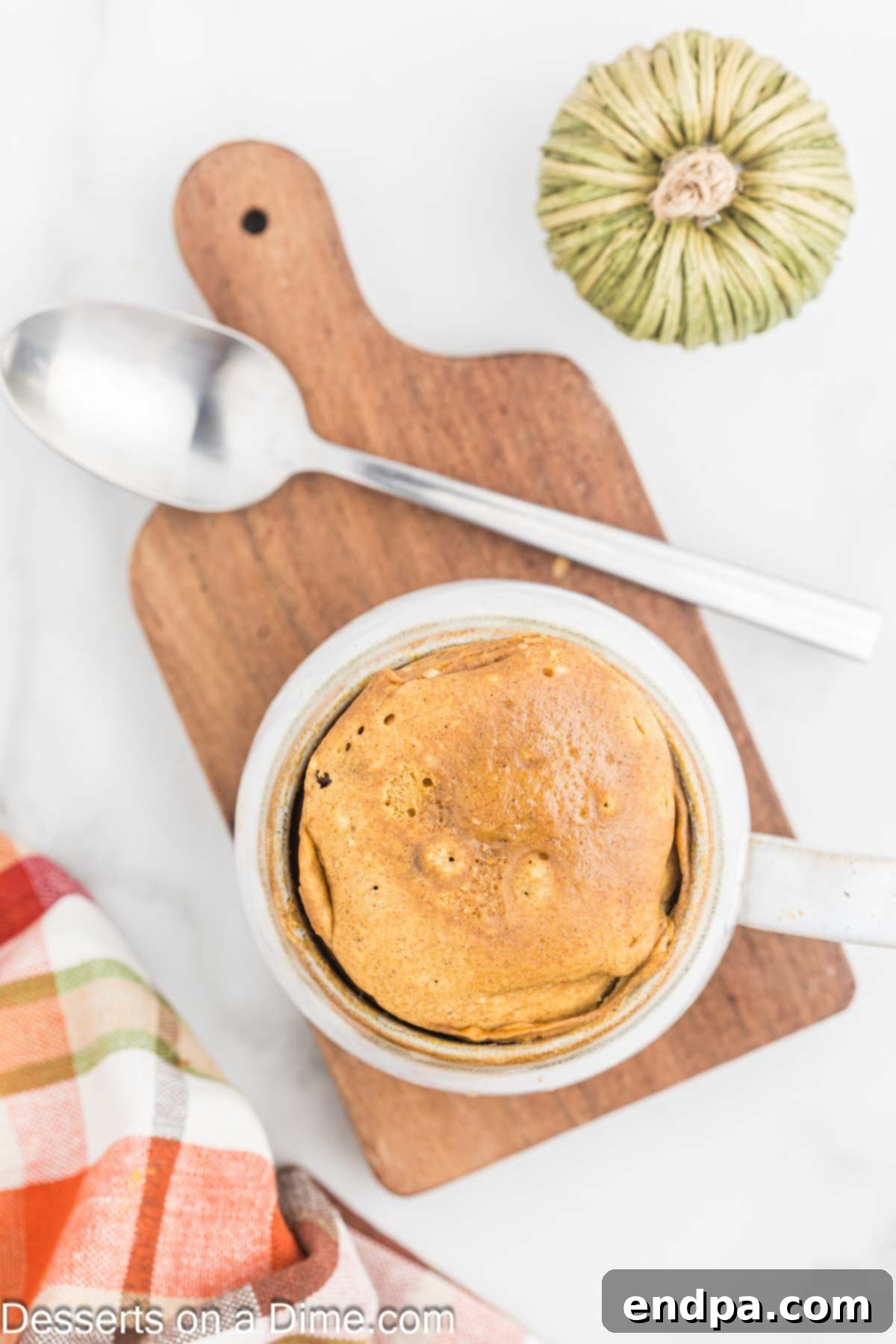 Pumpkin Mug Cake cooked and ready to enjoy.
