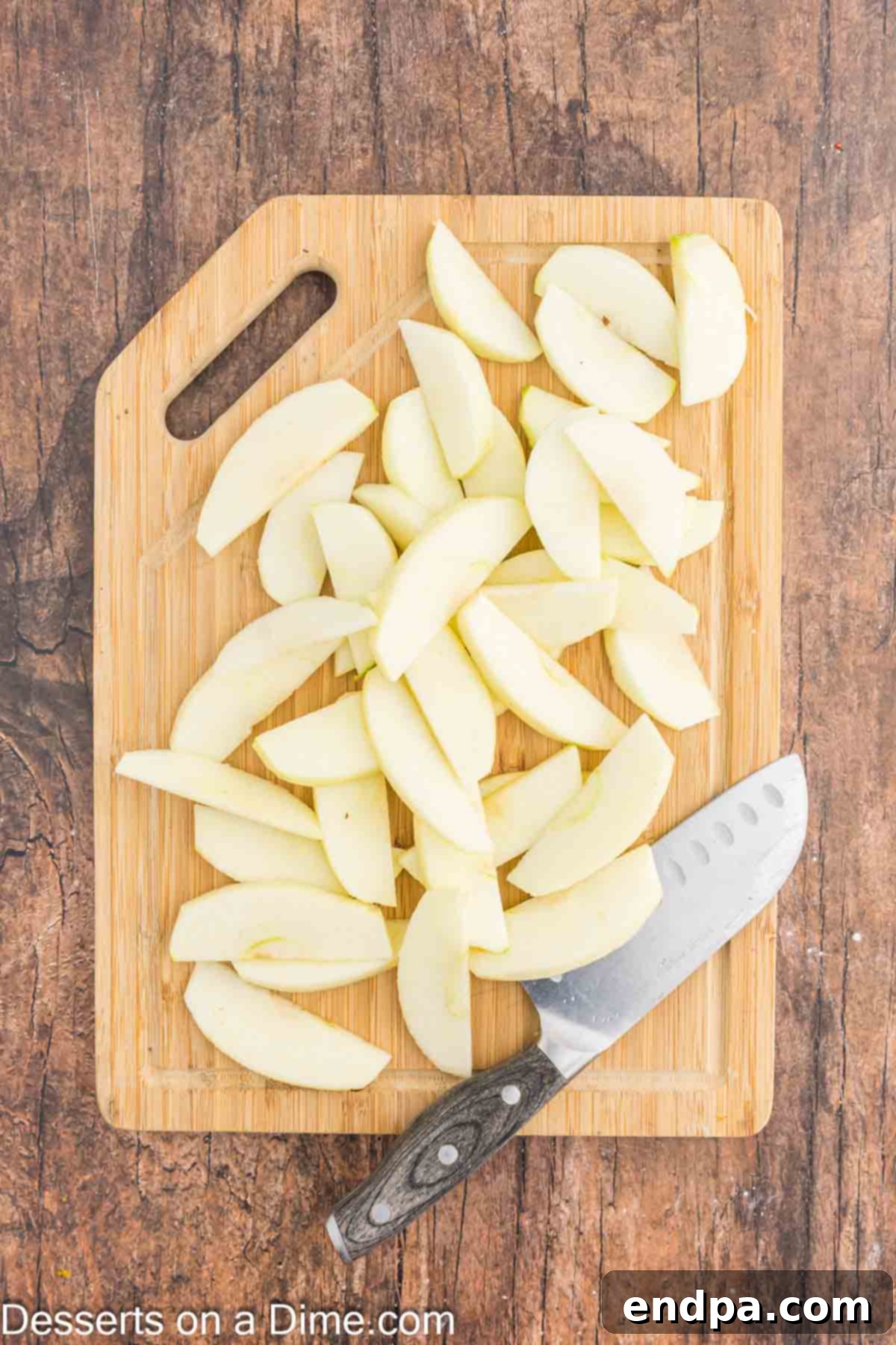Apple slices on a cutting board. 
