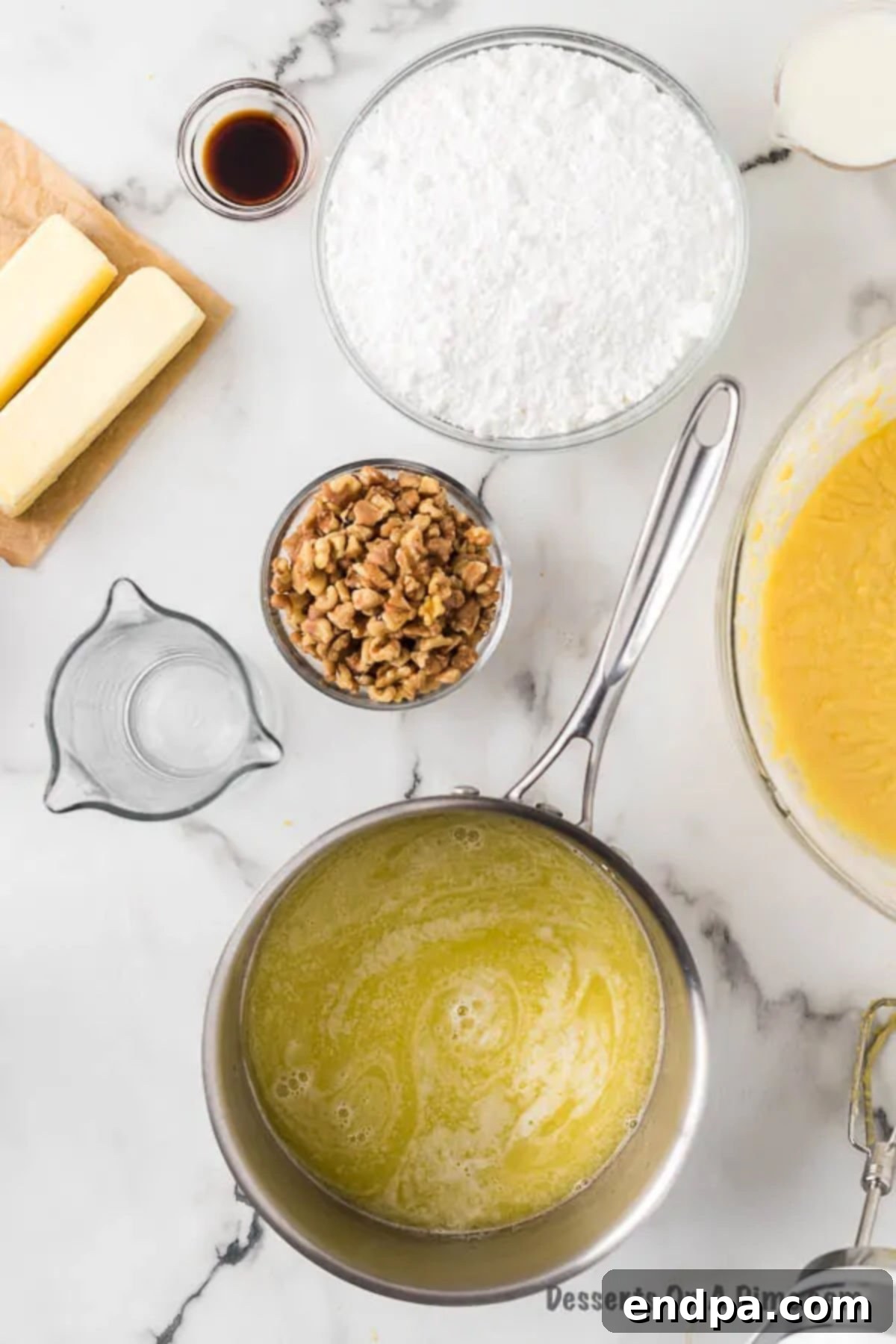 Melted butter simmering gently in a saucepan.