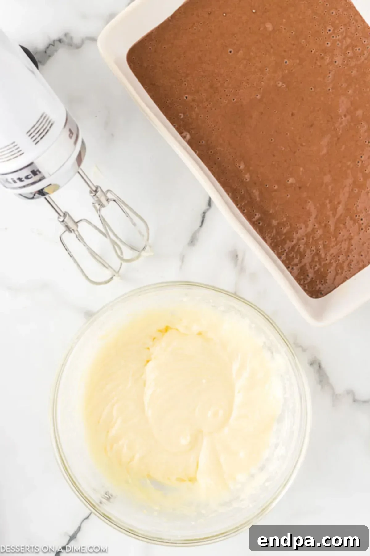 Decadent German Chocolate Cheesecake Bars 6 Cream cheese mixture in mixing bowl.