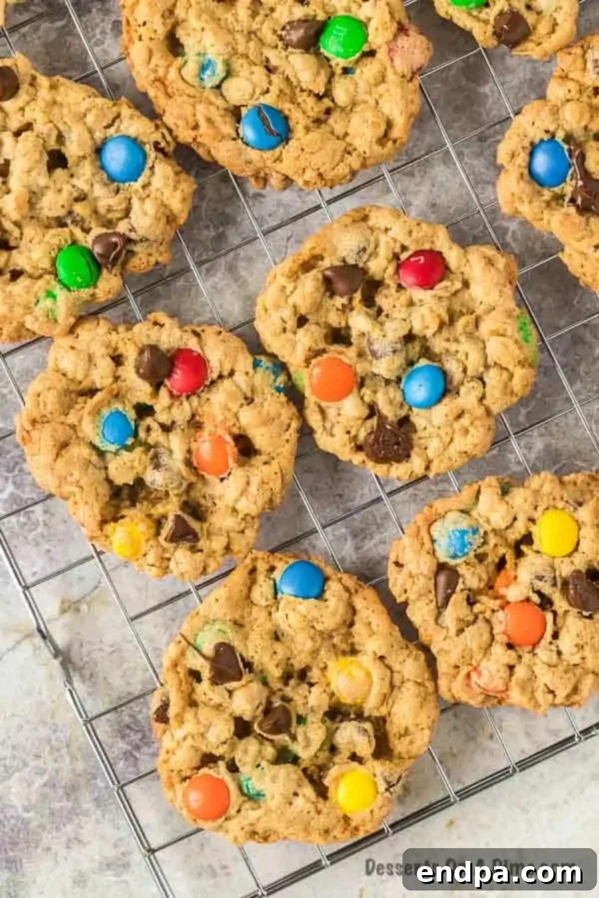 Monster cookies on wire rack.