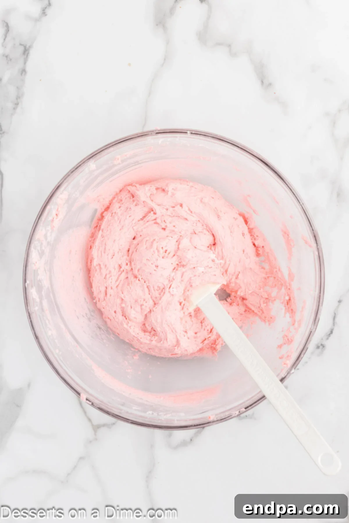 Cookie dough combined in a bowl, ready for shaping.