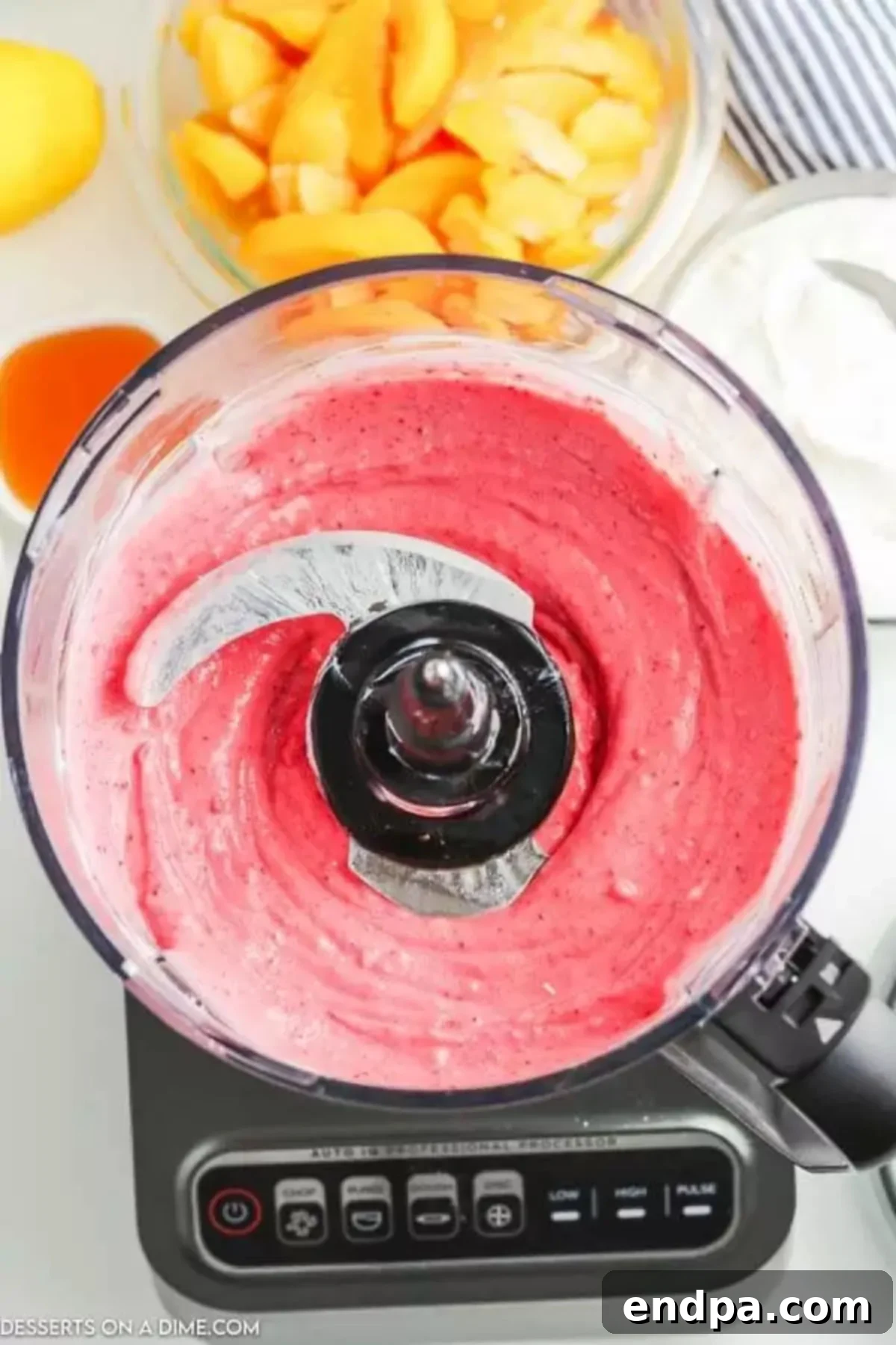 Cool & Creamy Homemade Frozen Yogurt 6 Smooth, blended frozen yogurt mixture in a food processor, ready to be served.