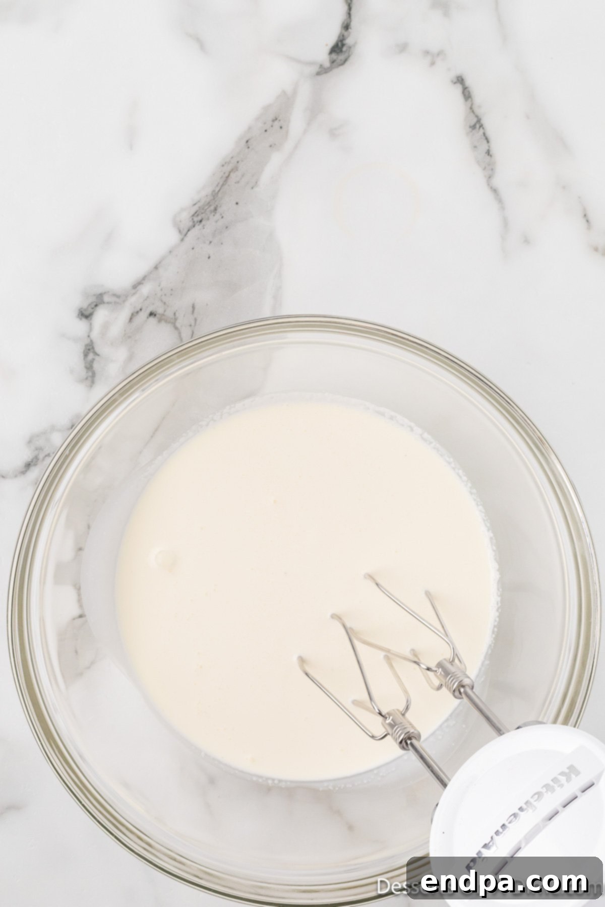 Mixing bowl with heavy cream. 