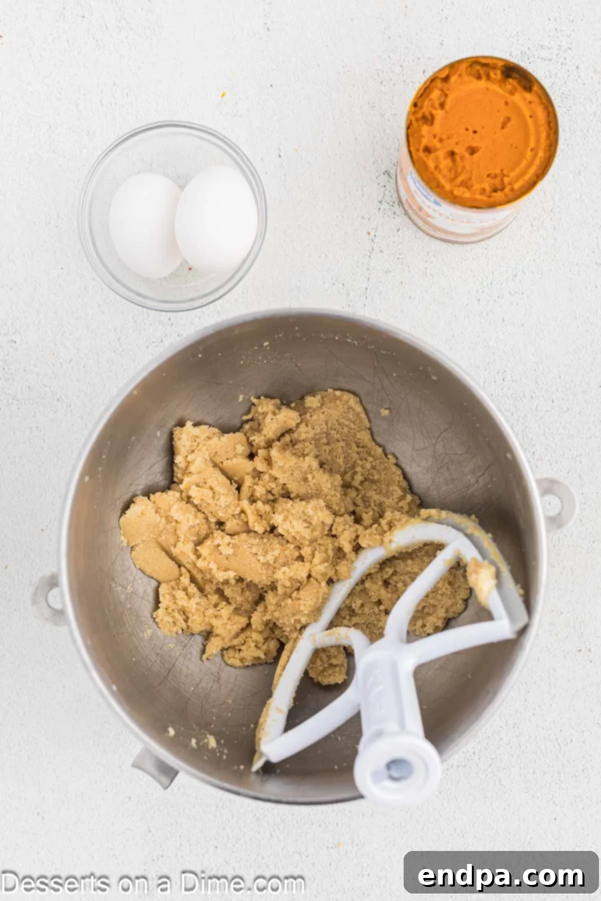 Starbucks-Style Pumpkin Spice Cream Cheese Muffins 6 Softened butter and both brown and granulated sugars creamed together in the bowl of a stand mixer.