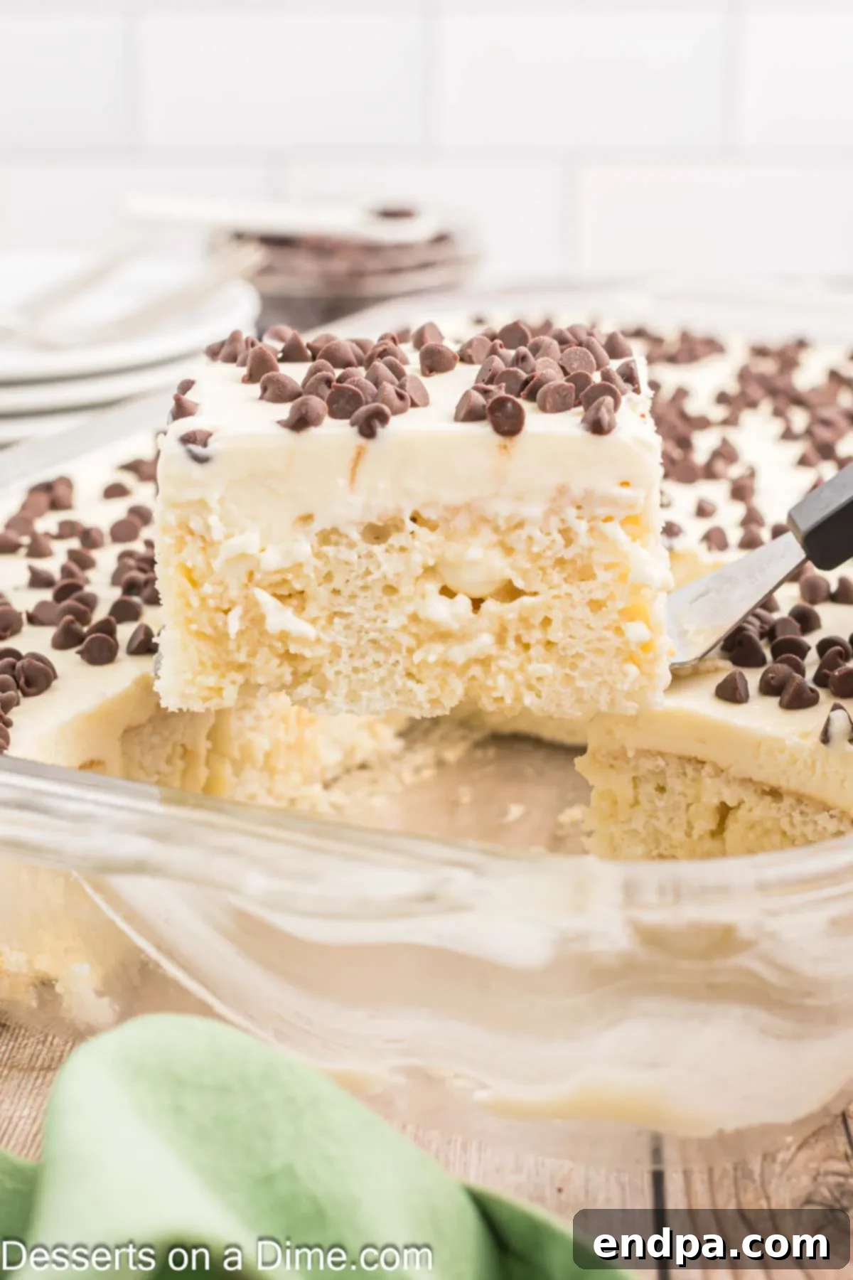 Cannoli Cake sliced and being served.