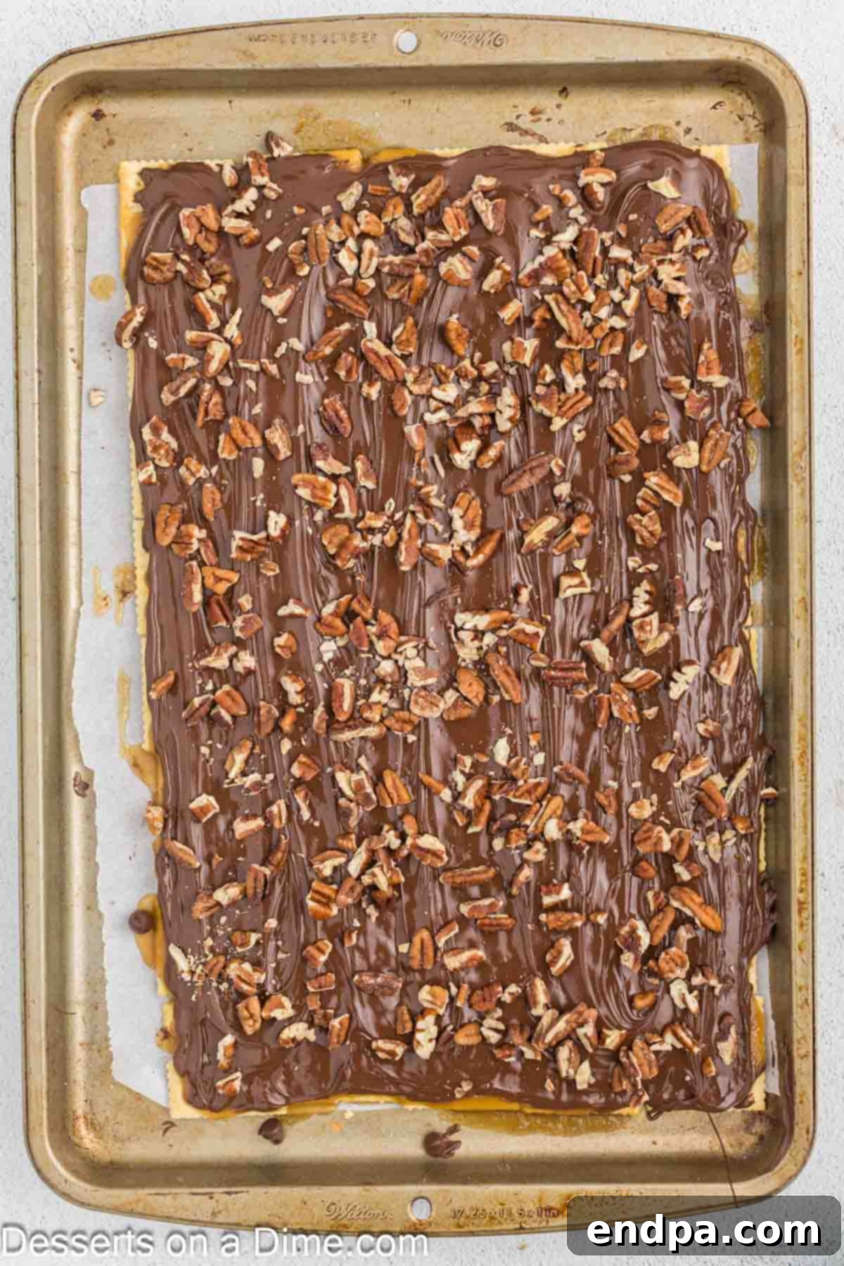 Sweet and Salty Toffee Bark 9 Chopped pecans sprinkled over the still-warm, melted chocolate layer on the toffee, adding texture and flavor.