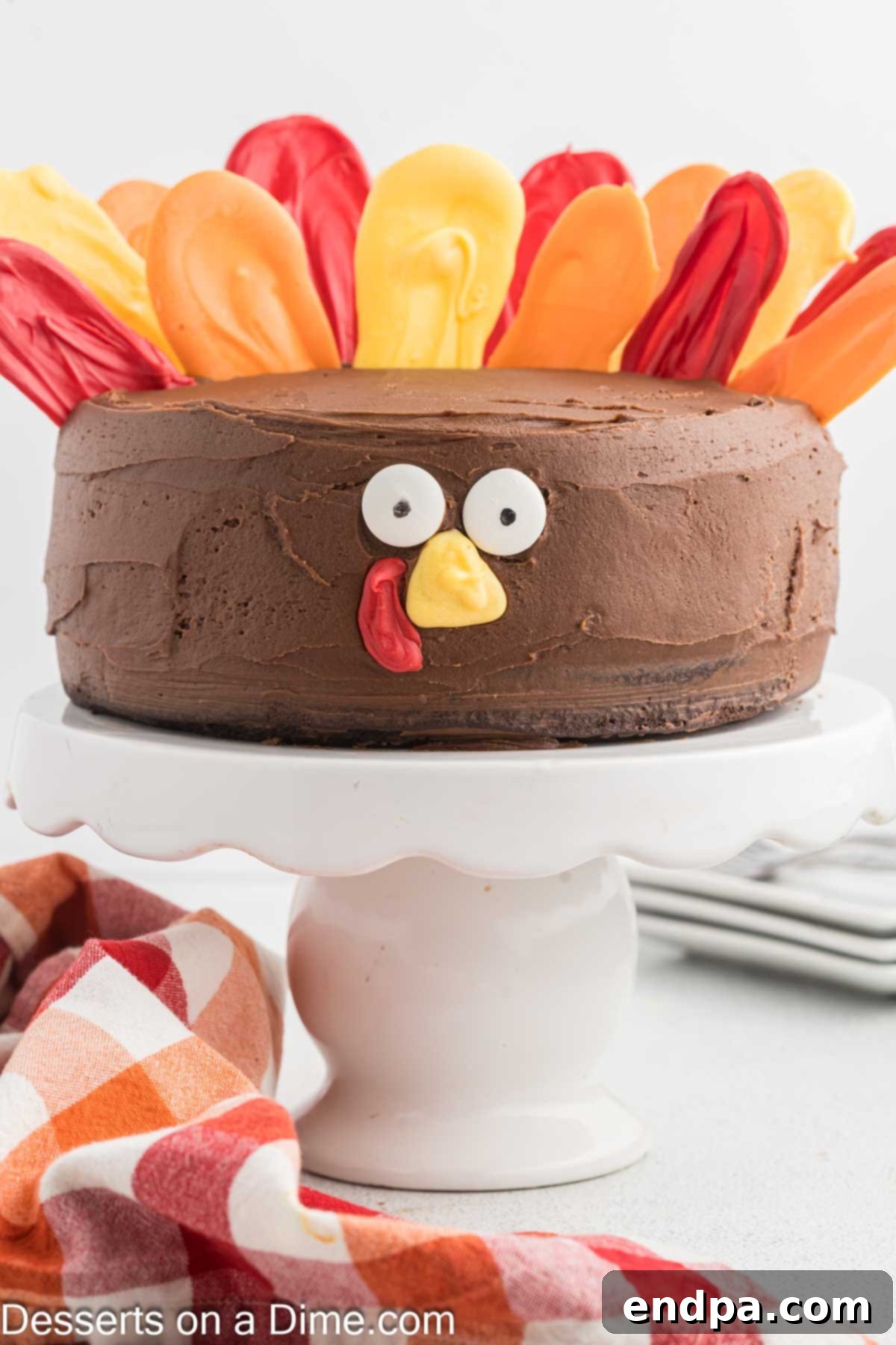 Festive Turkey Cake 2 Festive Turkey Cake on an elegant pedestal, ready for Thanksgiving.