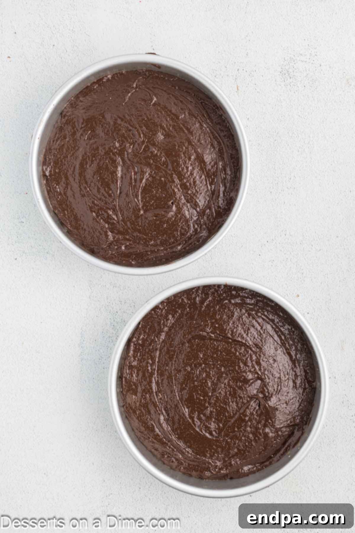 Festive Turkey Cake 5 Cake batter in baking pans.