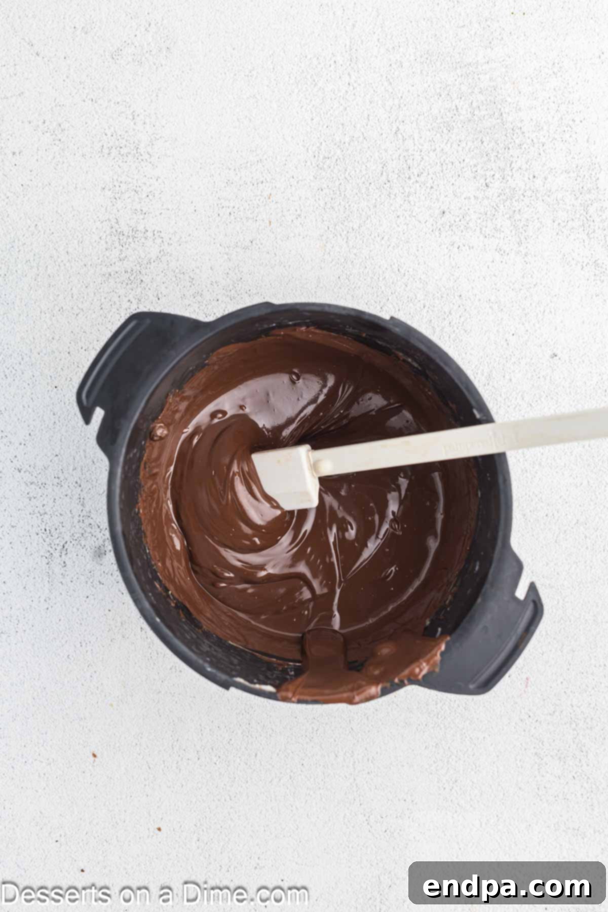 Fudgy Brownie Bonbons 7 Melted chocolate in a bowl.