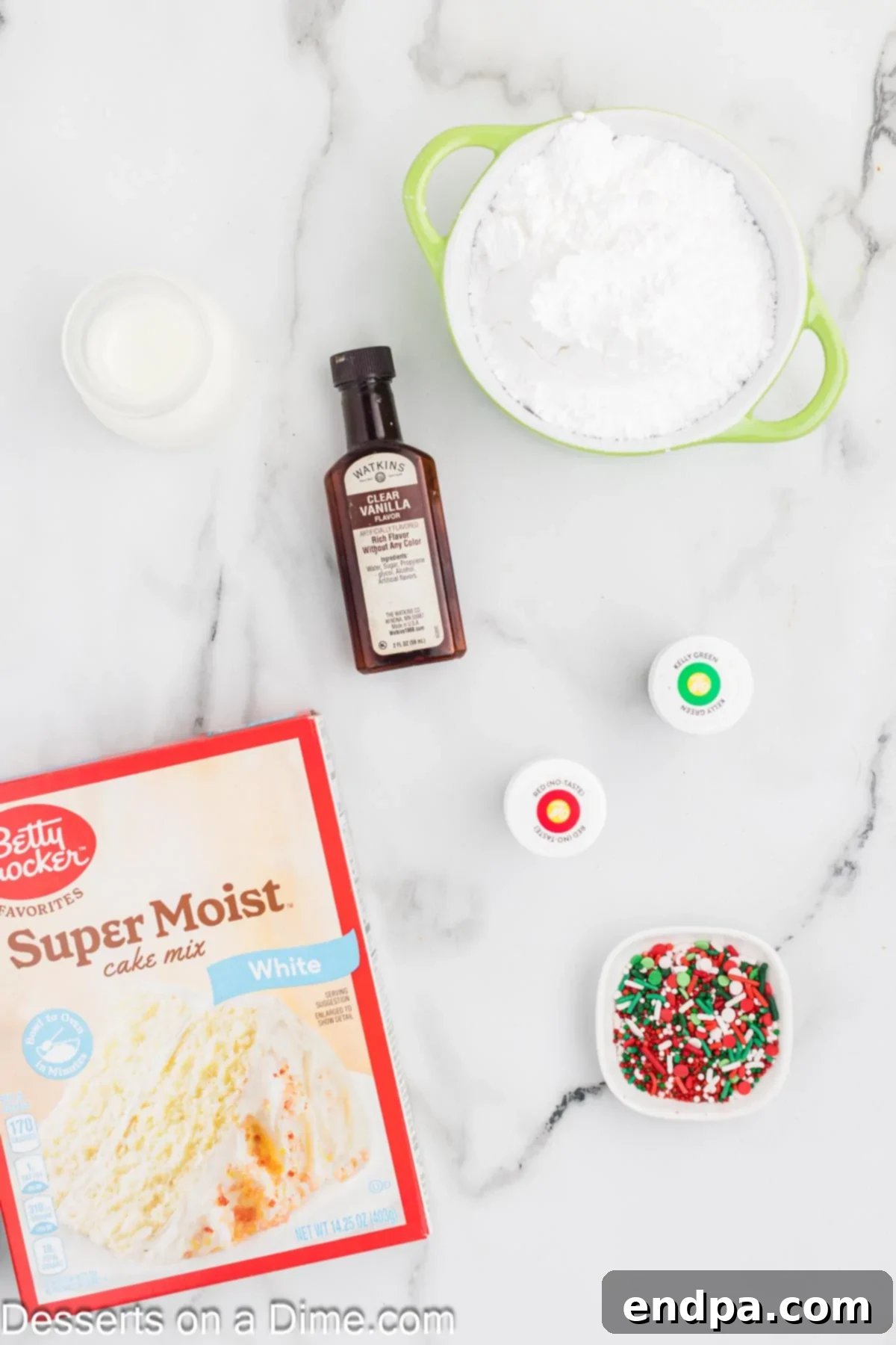 Ingredients for Christmas Bundt Cake including white cake mix, red and green gel food coloring, powdered sugar, milk, clear vanilla extract, and Christmas sprinkles.