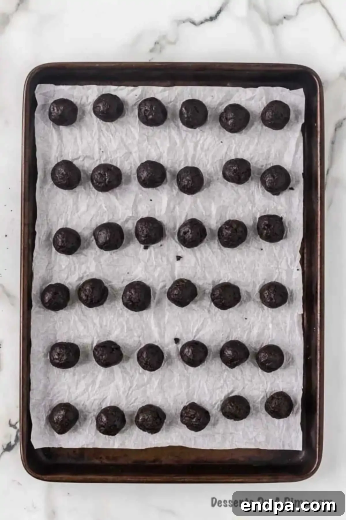 Oreo Balls on baking sheet. 
