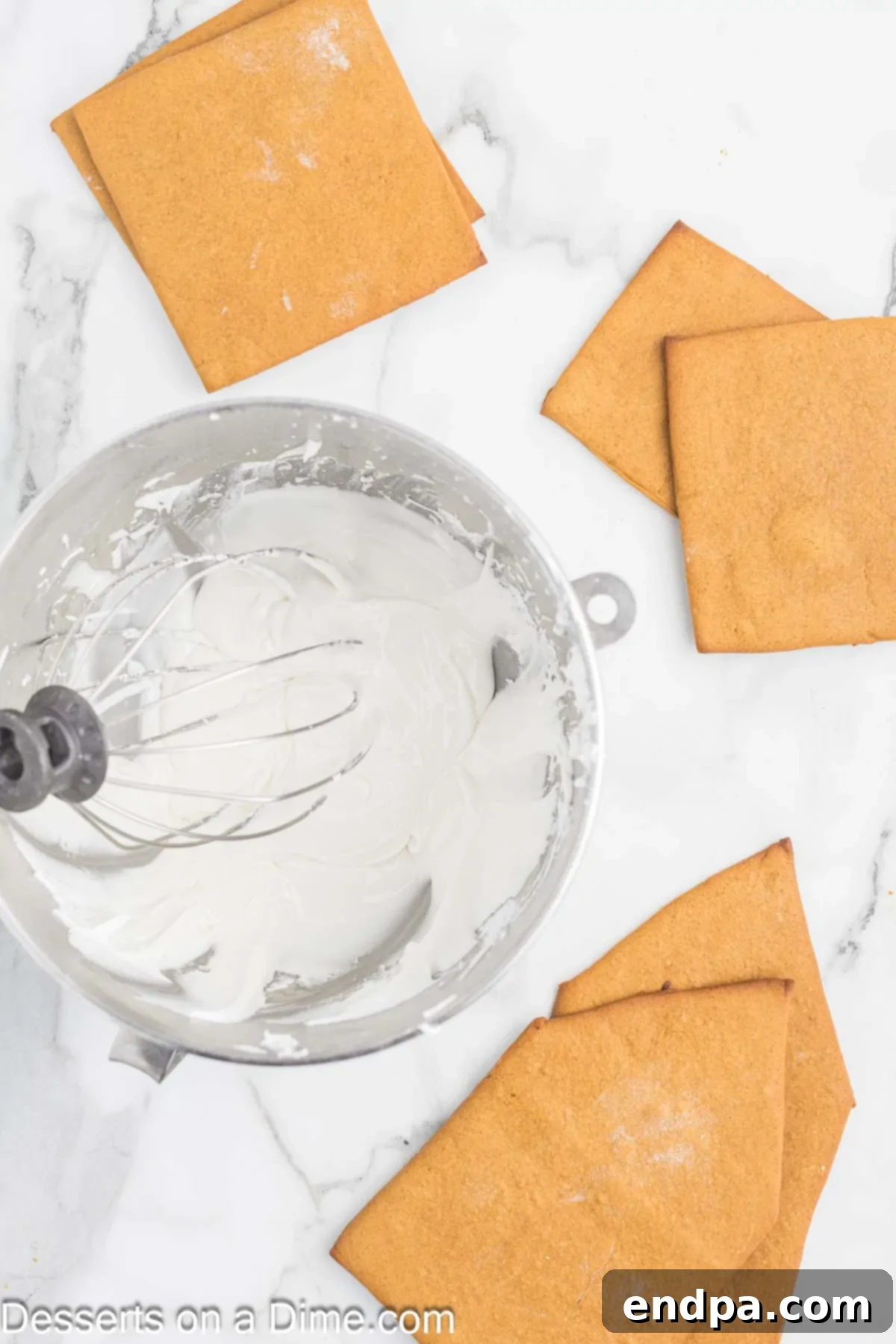 Spiced Sugar Sanctuary 10 Royal icing ingredients combined and whipped to stiff peaks in a stand mixer, demonstrating the correct consistency for assembly.
