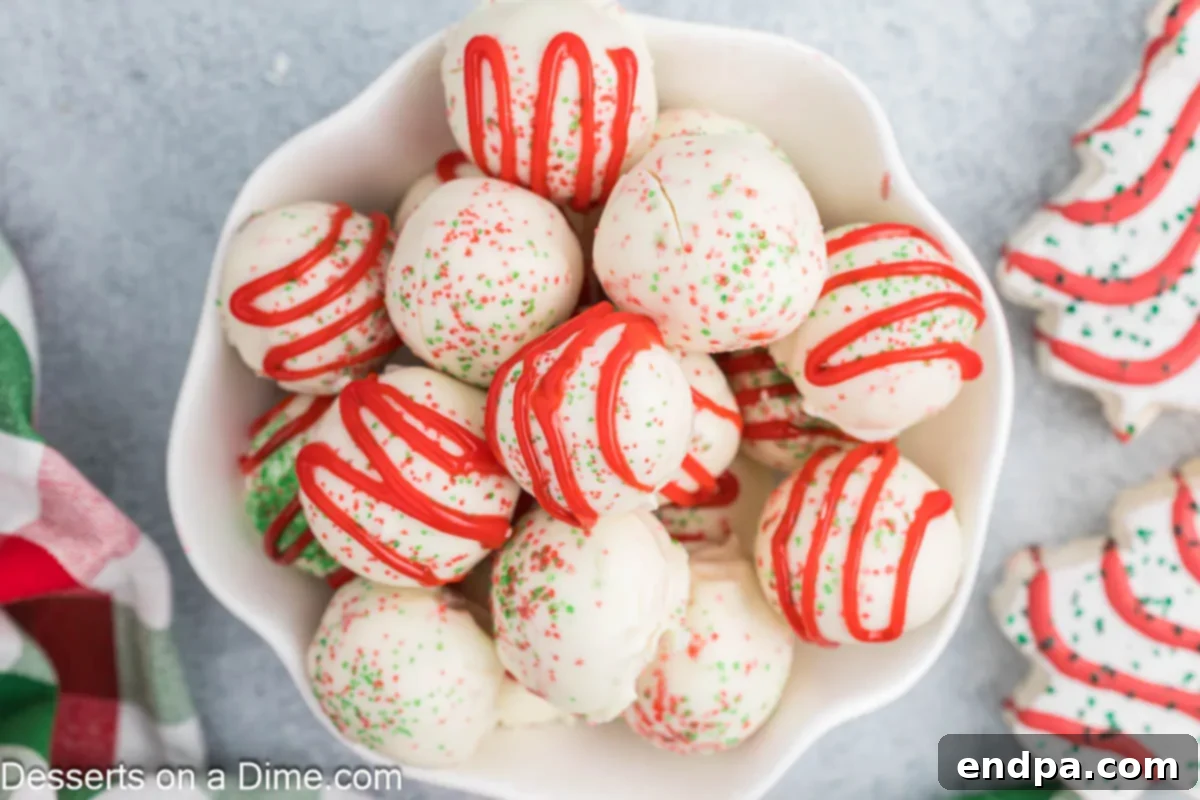 Little Debbie Christmas tree cake balls in a white bowl.