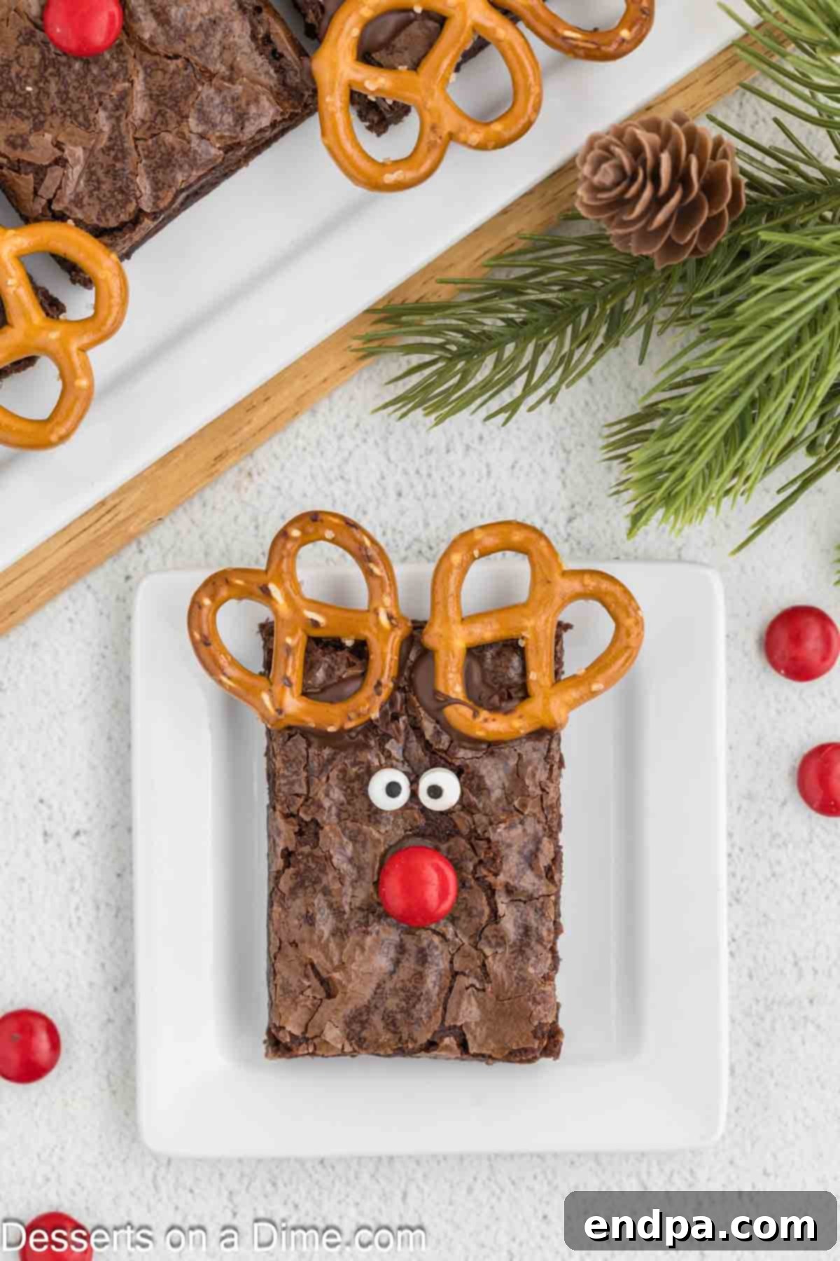 Christmas Antler Brownies 8 A plate stacked with several decorated Reindeer Brownies, highlighting their festive appearance and readiness for a holiday party.