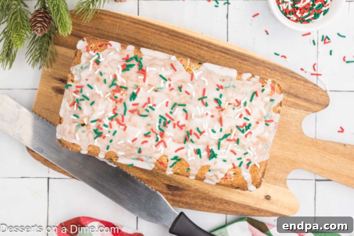 Yuletide Bake 2 Christmas bread topped with a sweet glaze and festive sprinkles, ready to be enjoyed during the holidays.