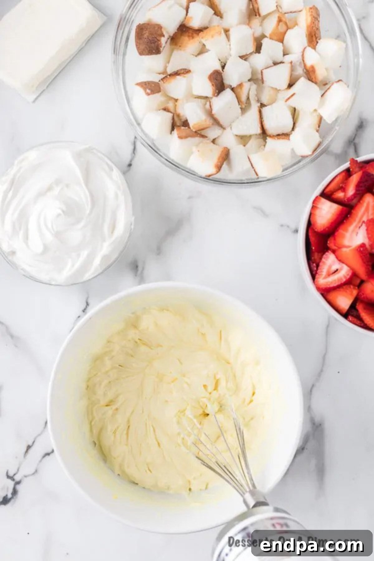 Bowl with vanilla pudding mixture. 