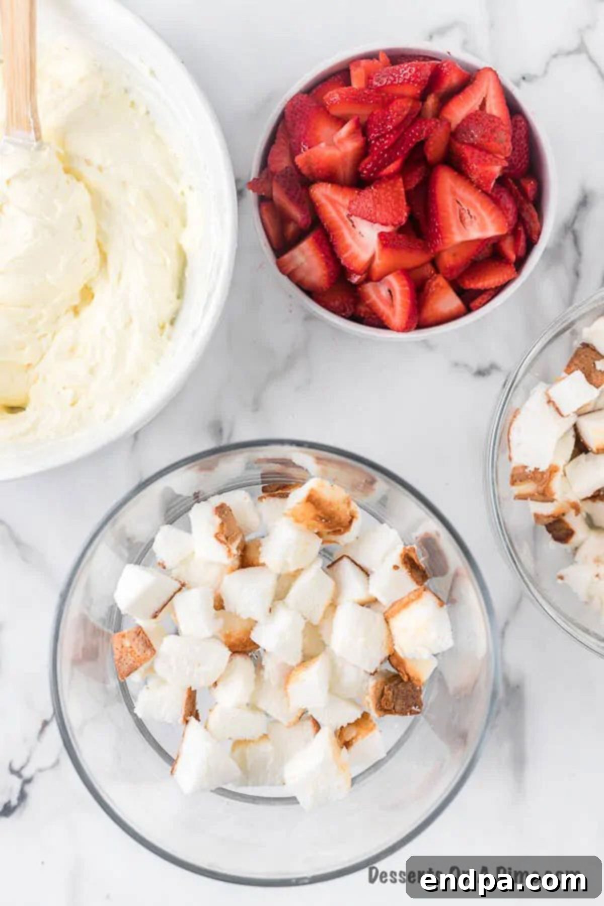 Cubes of cake layered in dish. 