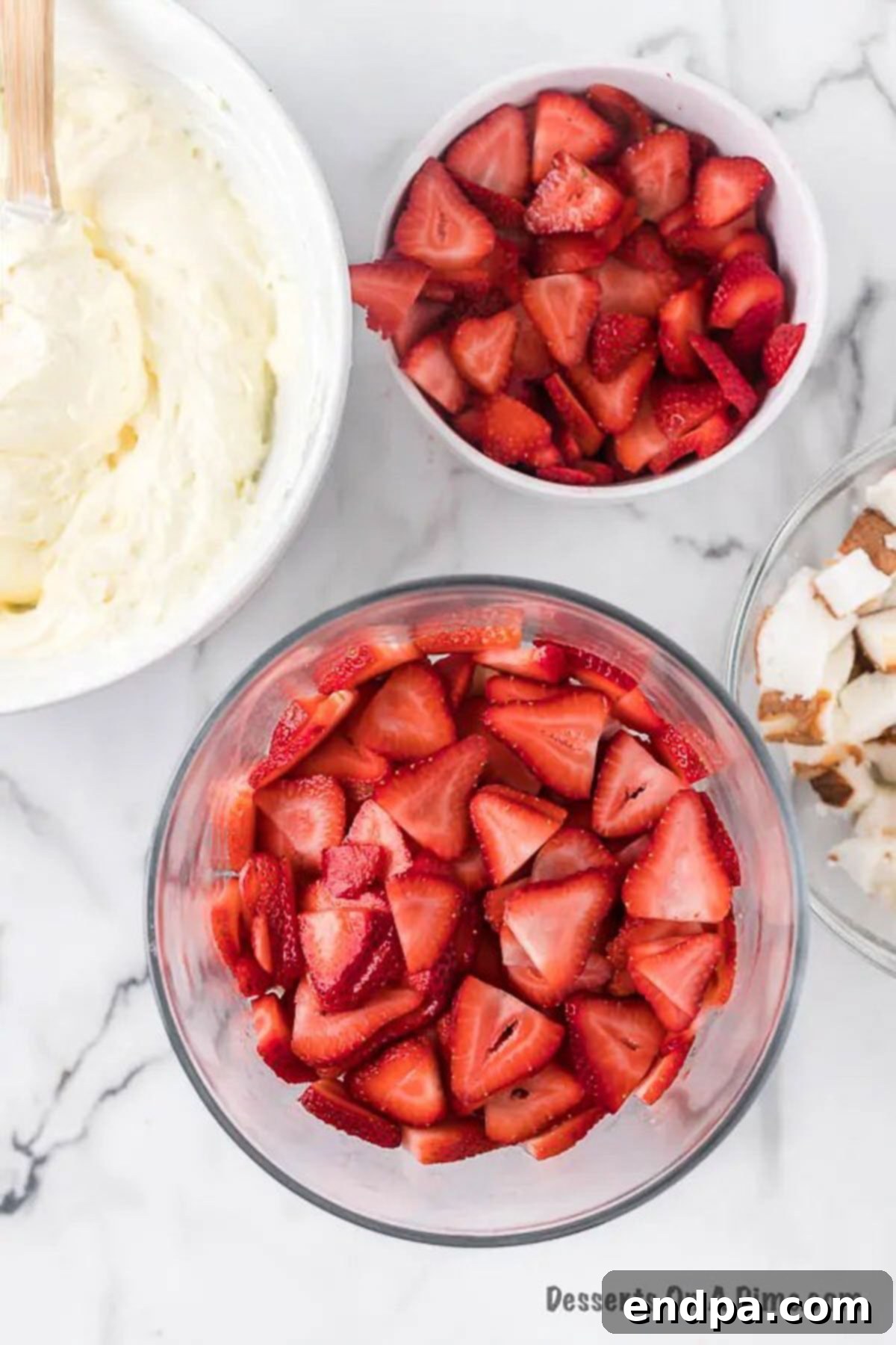 Strawberries layered on top. 