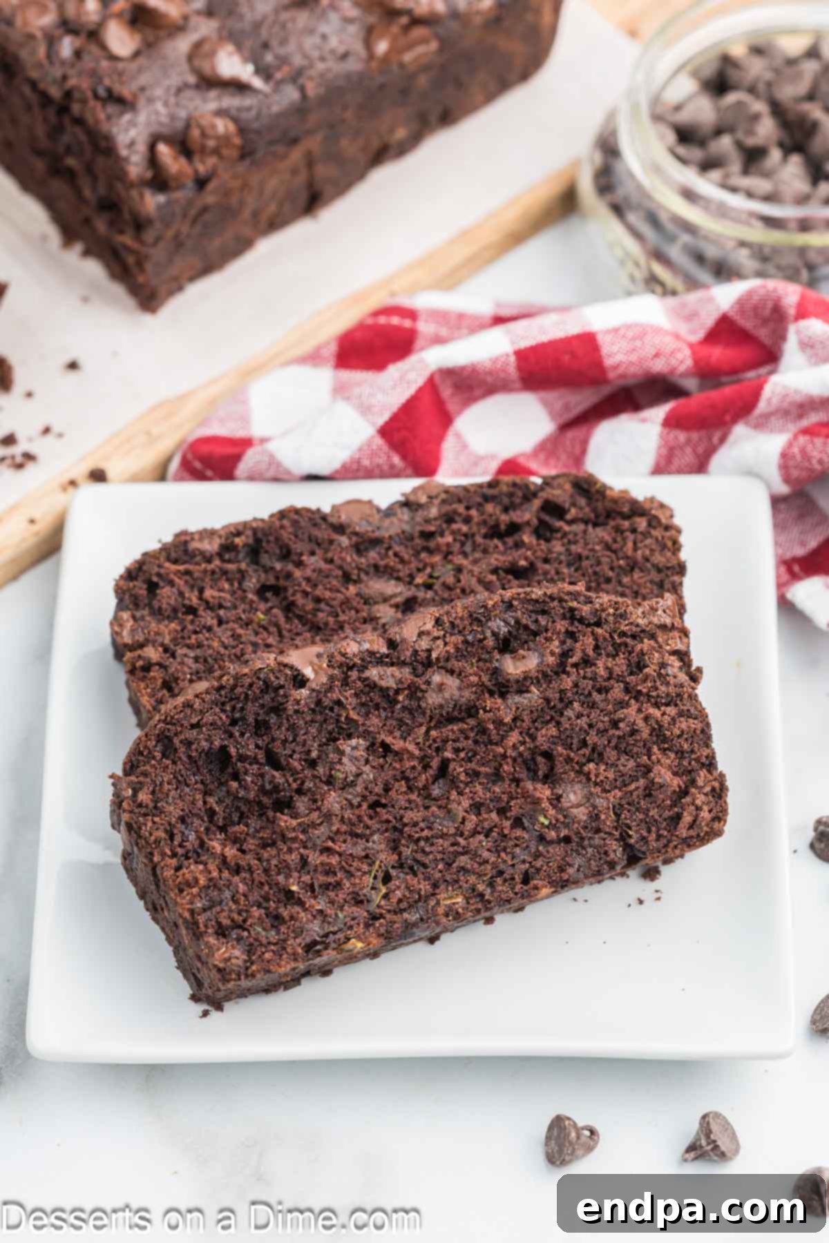 Fudgy Chocolate Zucchini Bread 9 Freshly baked chocolate zucchini bread cooling on a wire rack.