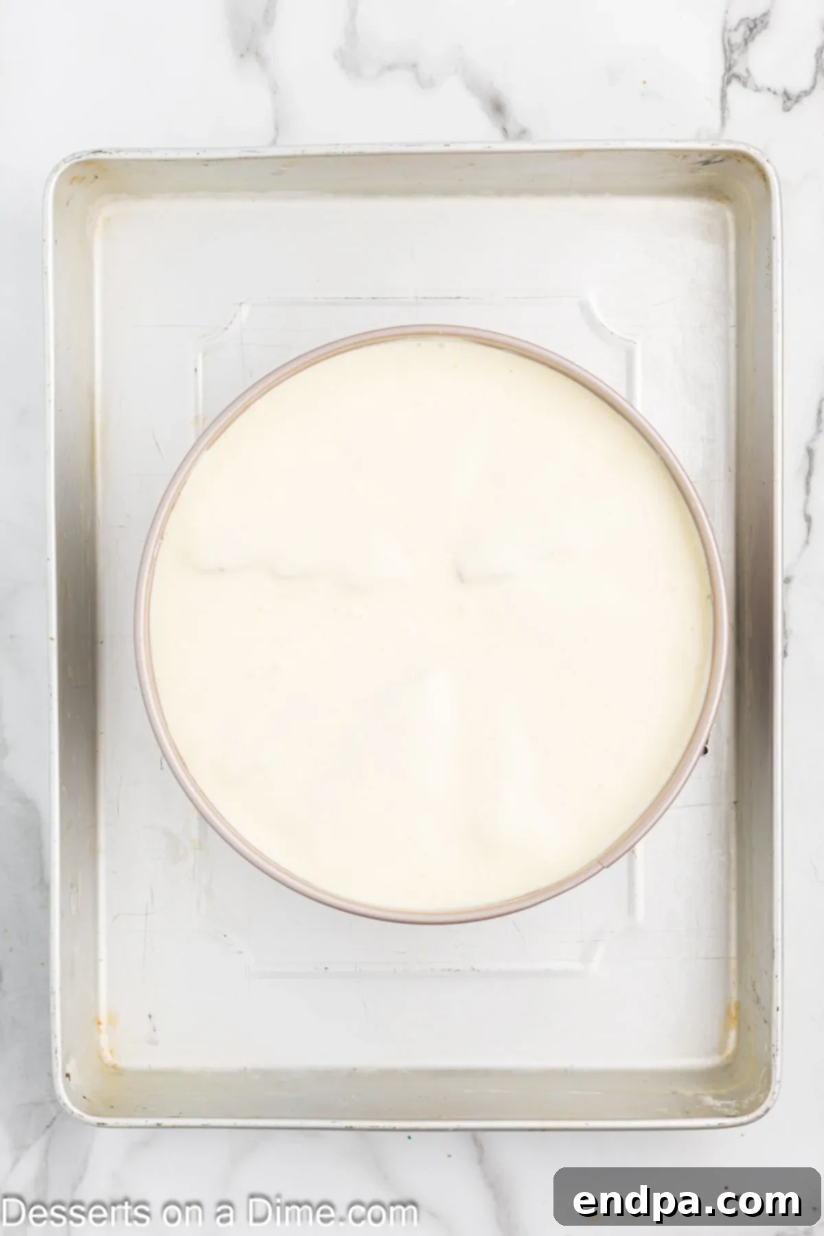 Remaining cheesecake batter poured over snack cakes. 