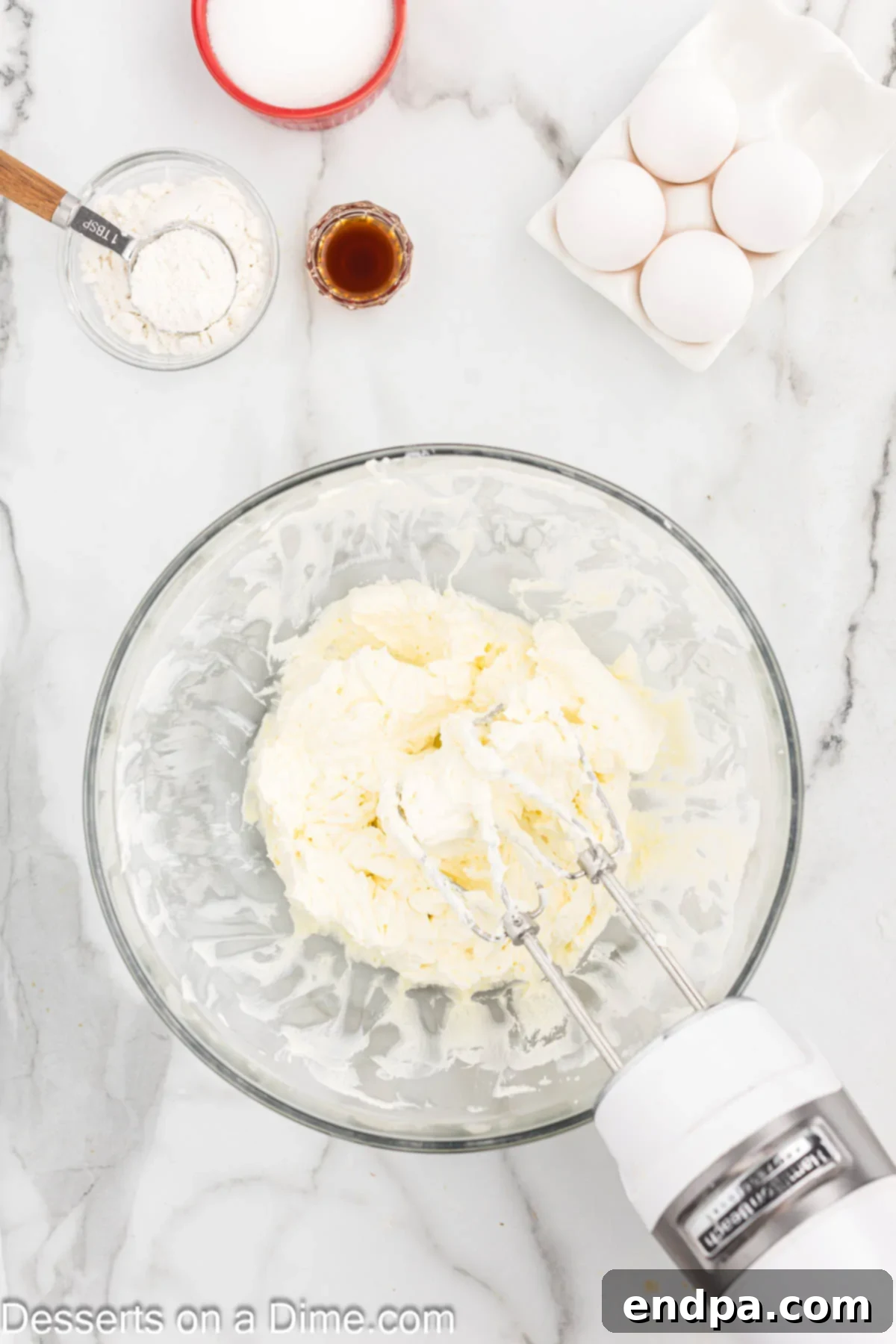 Cream cheese beat until fluffy. 