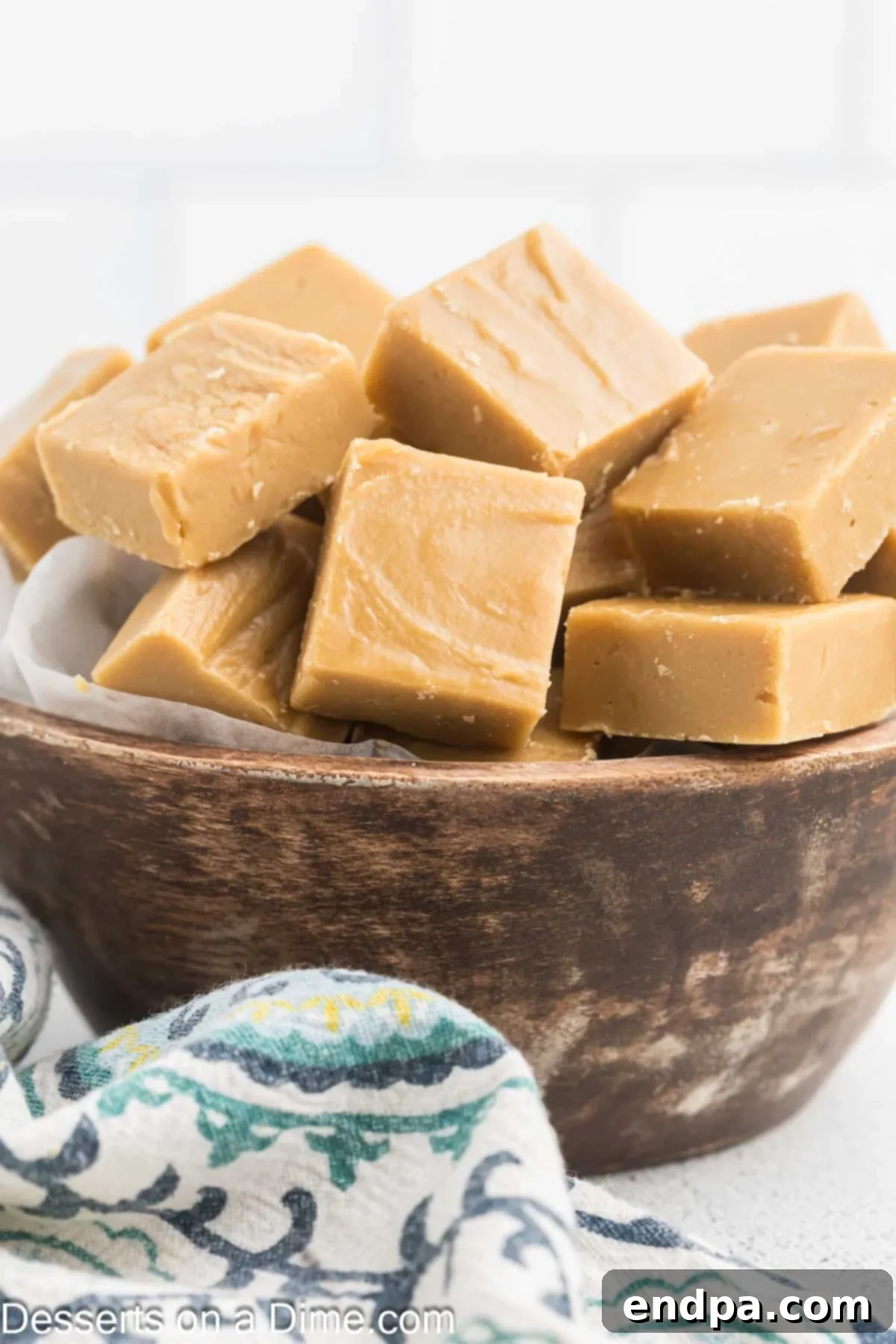 Creamy Maple Fudge 10 Maple fudge cut into neat, uniform pieces, ready for serving.