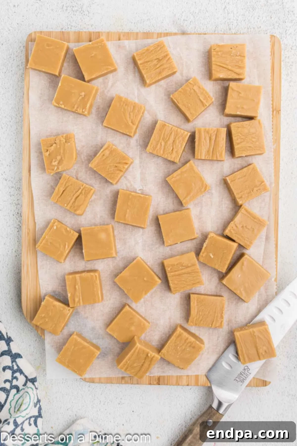Creamy Maple Fudge 9 Fudge fully set and lifted from the pan, ready to be cut into squares.