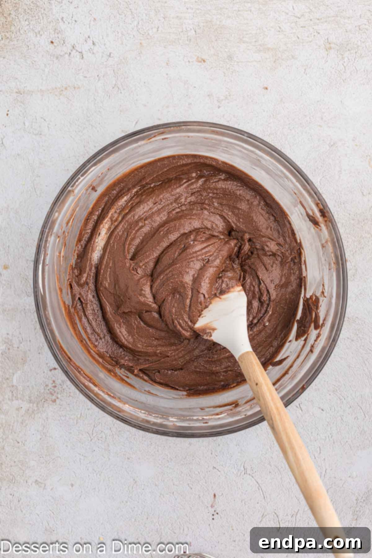 Velvet Chocolate Loaf 6 The dry flour and cocoa mixture is gently folded into the wet butter and egg mixture until just combined.